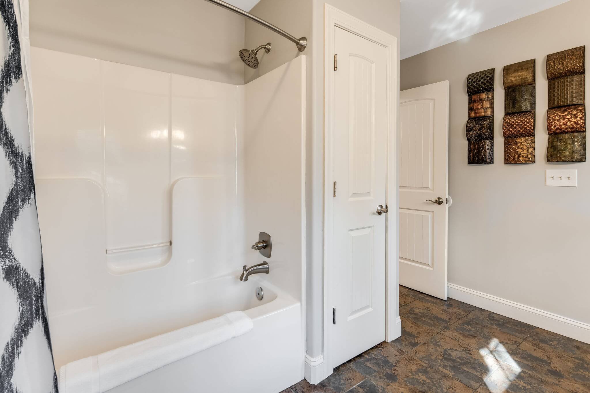 Full shower tub combo in spacious cottage bath