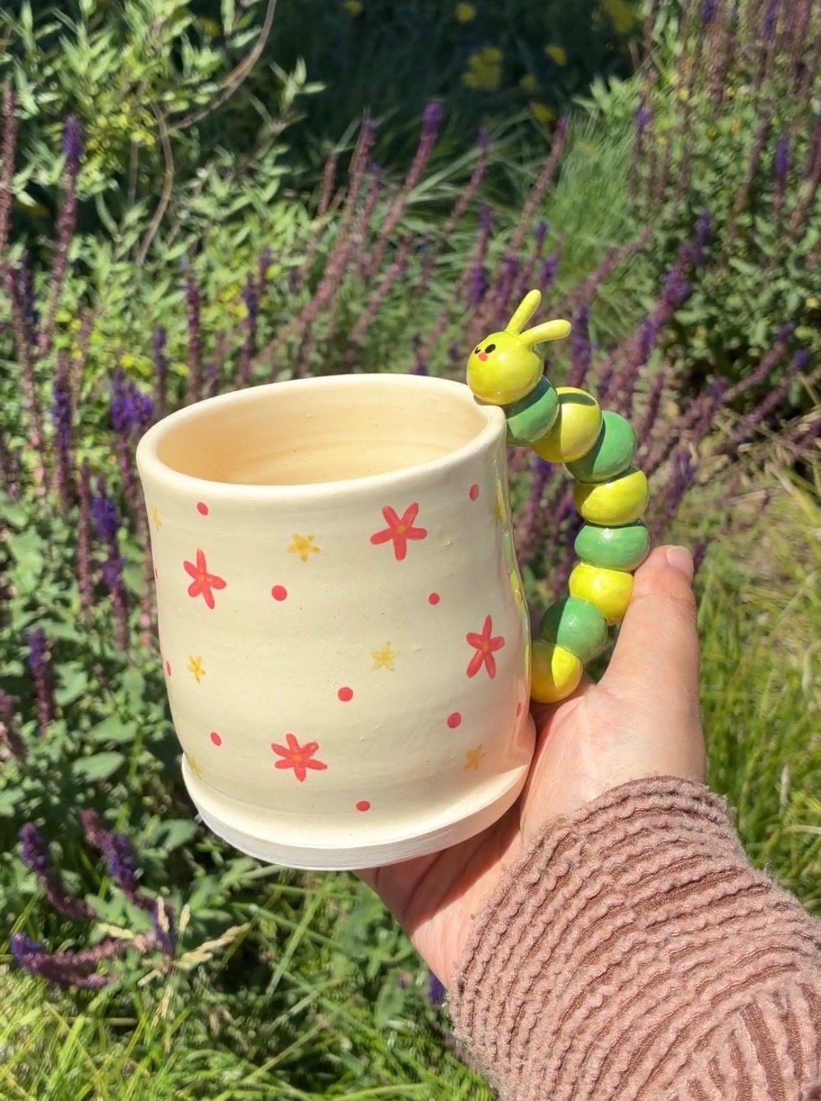 cute mug with a caterpillar handle