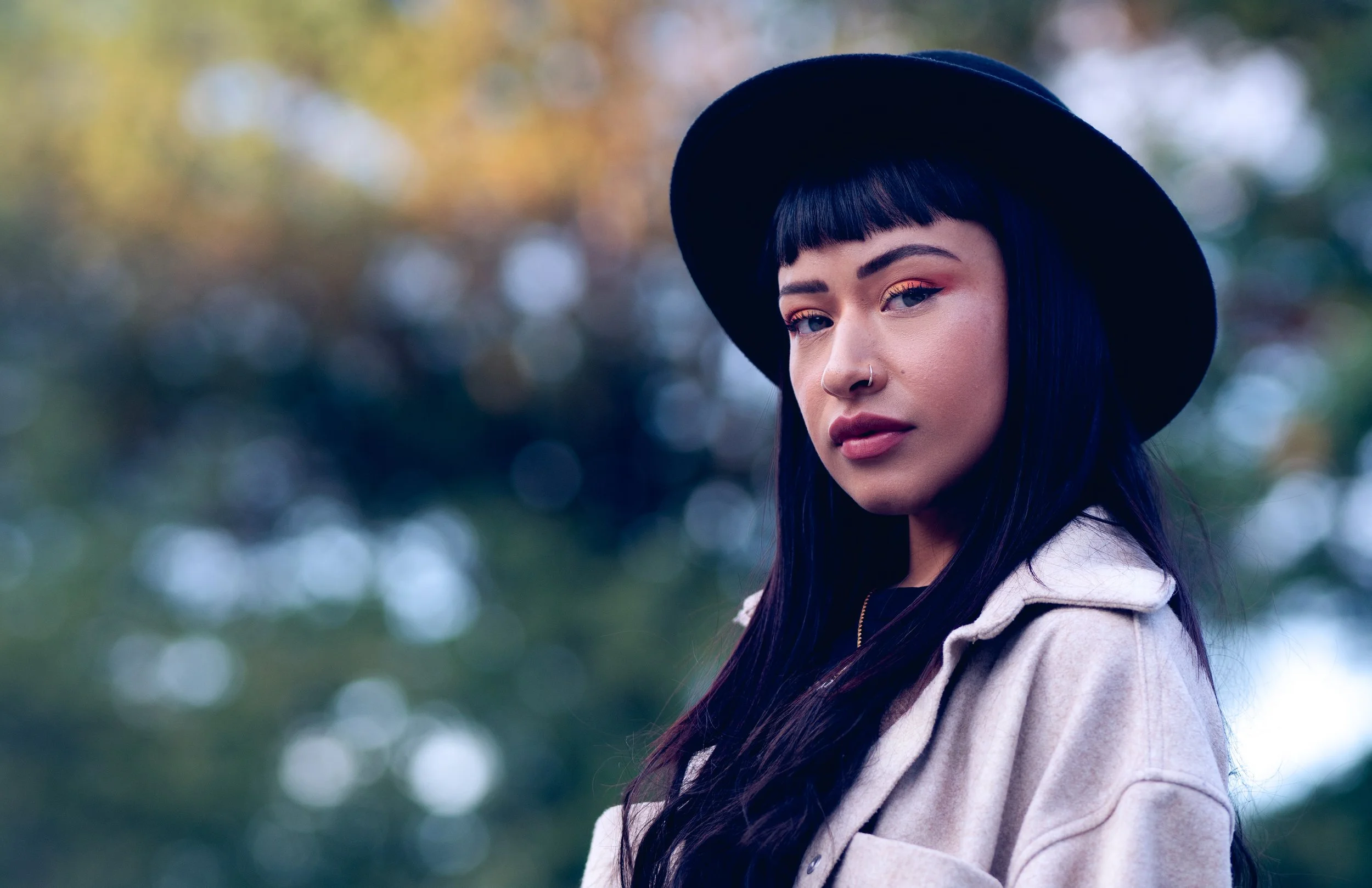Editorial portrait of Daniela in natural light with soft expression in New York City