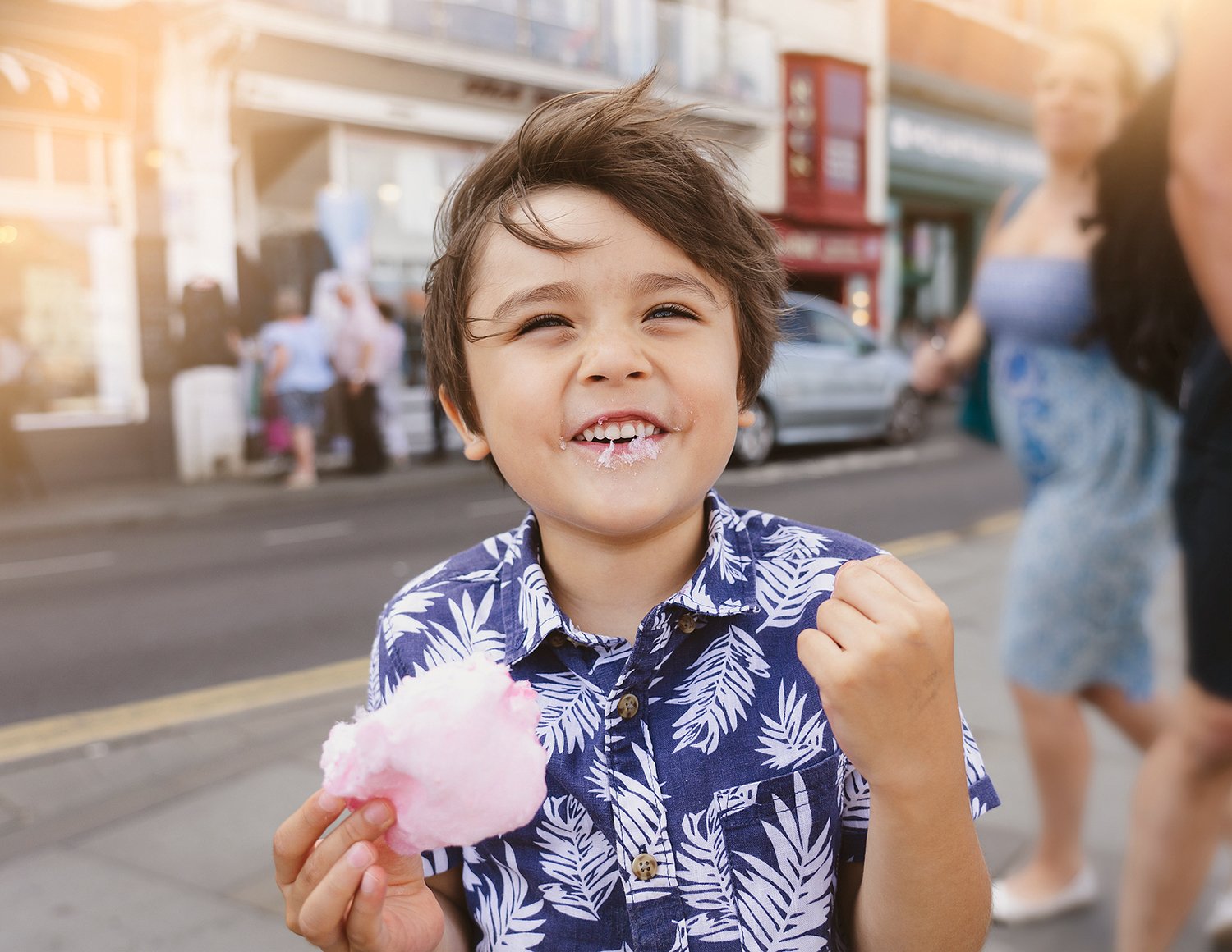 bigstock-Smiling-Kid-Eating-Cotton-Cand-407323139 web.jpg