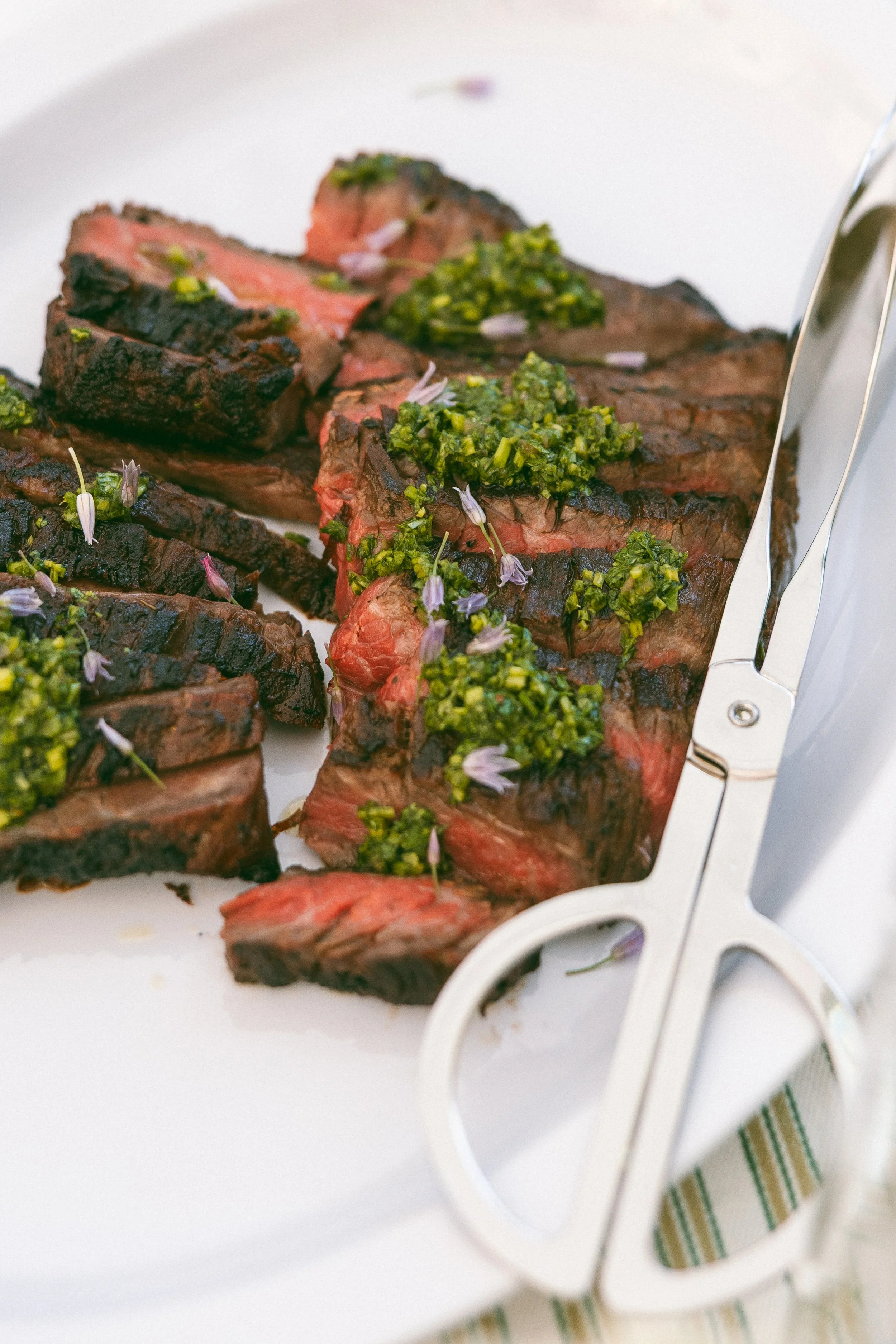 Grilled bavette steak with herb chimichurri - photo by Carney Abbott