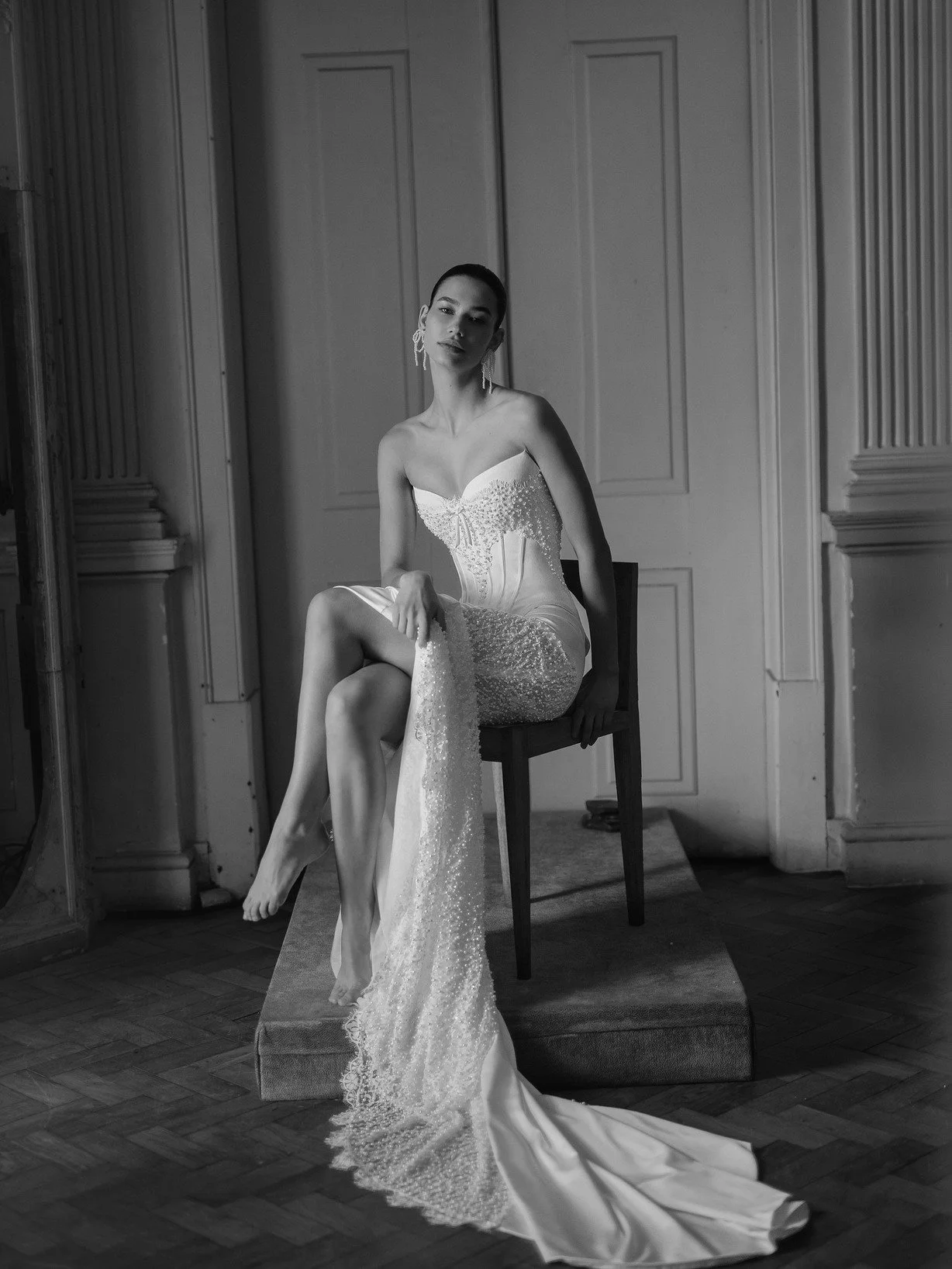 New gown alert - Gaia by Wona Concept! Gaia features a structured corset bodice with pearl embroidery, a tiny bow at the center of the plunge, and delicate pearl detail along the hips. Finished with a sleek mermaid skirt and rich embroidery at the si