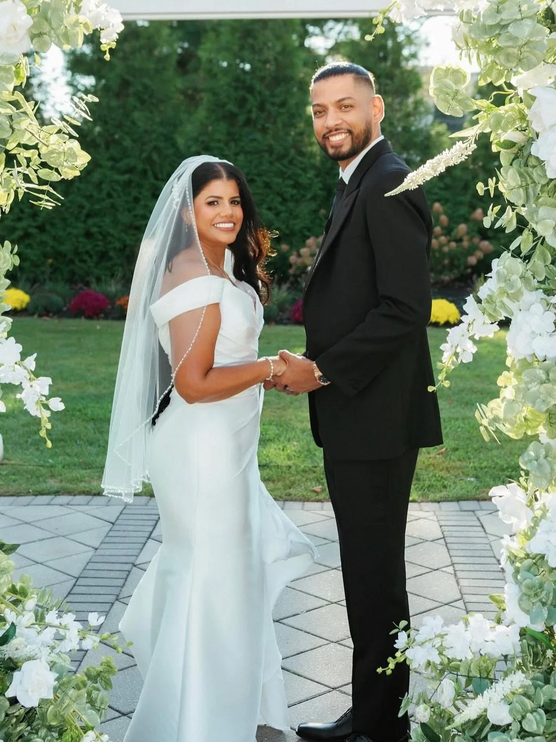 Sabrina looked so beautiful on her wedding day! We loved getting to make her gown feel even more personal during alterations by transforming it from a V-neck into a strapless off the shoulder look. Wishing her the sweetest marriage and so much happin