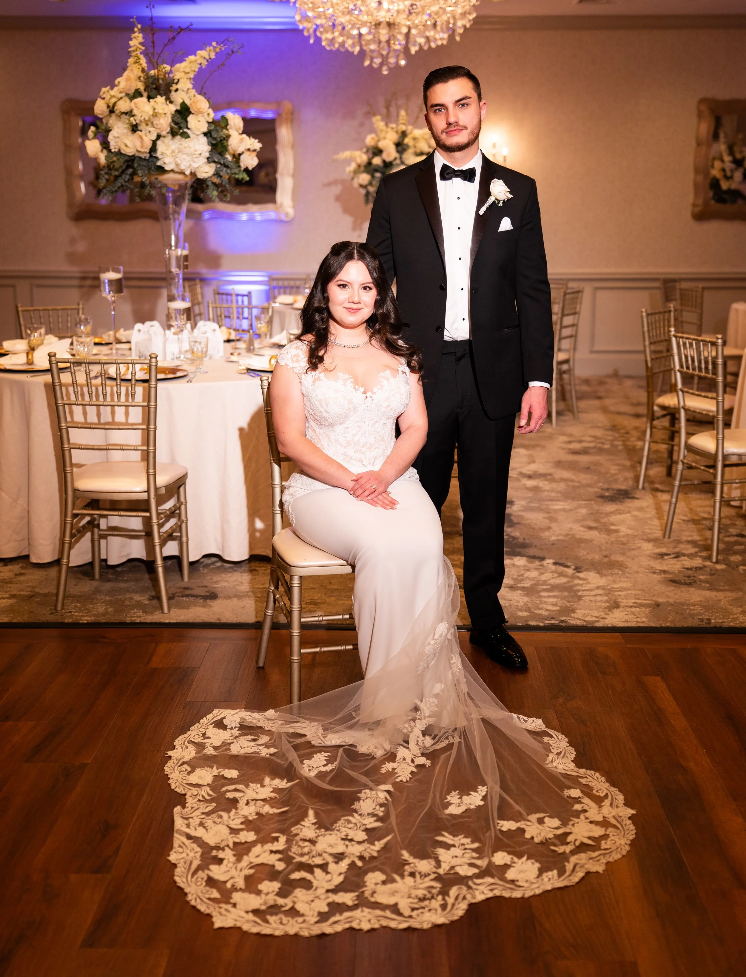 fitted lace bridal gown in ballroom reception