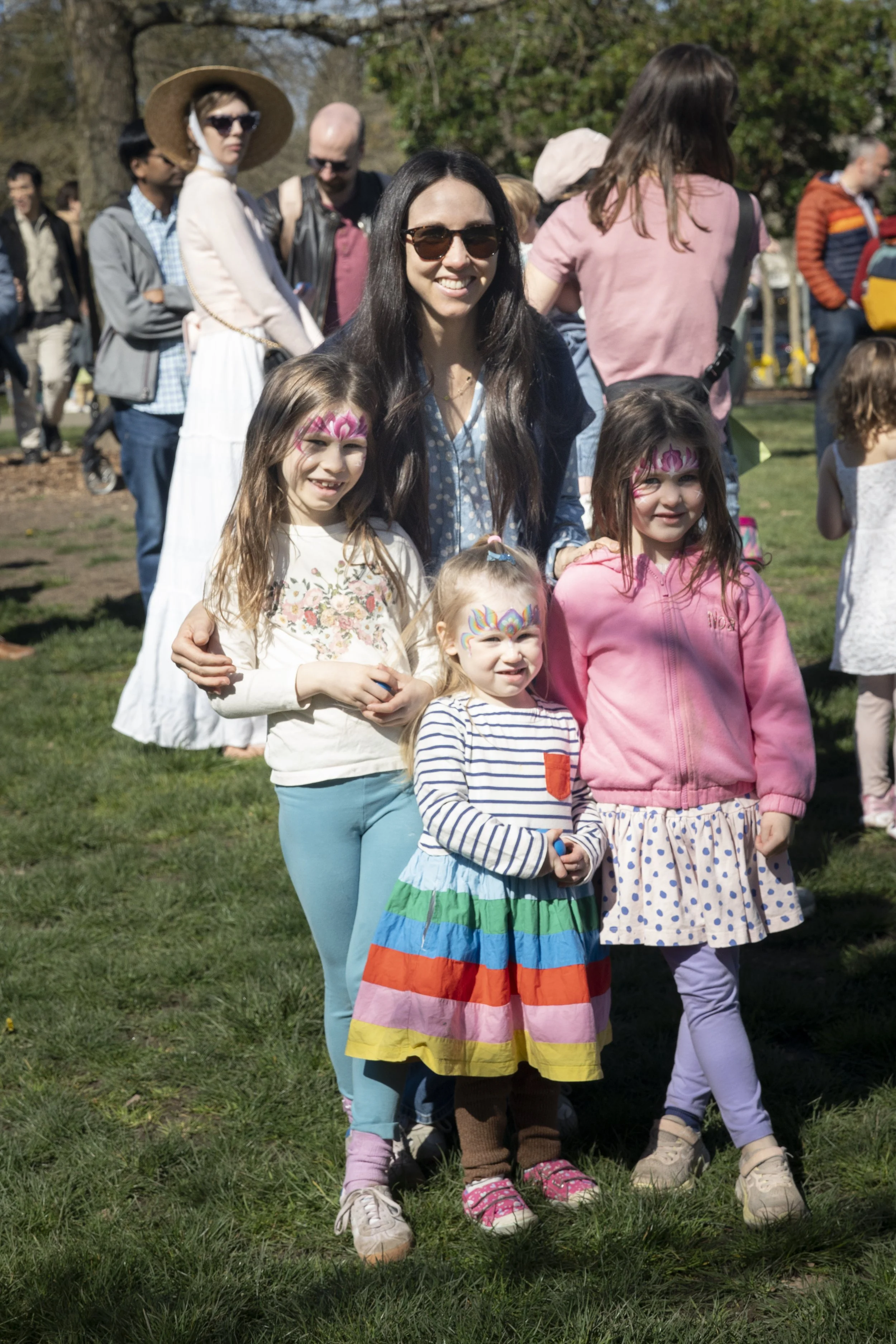 Mom and three girls at madison park easter egg hunt