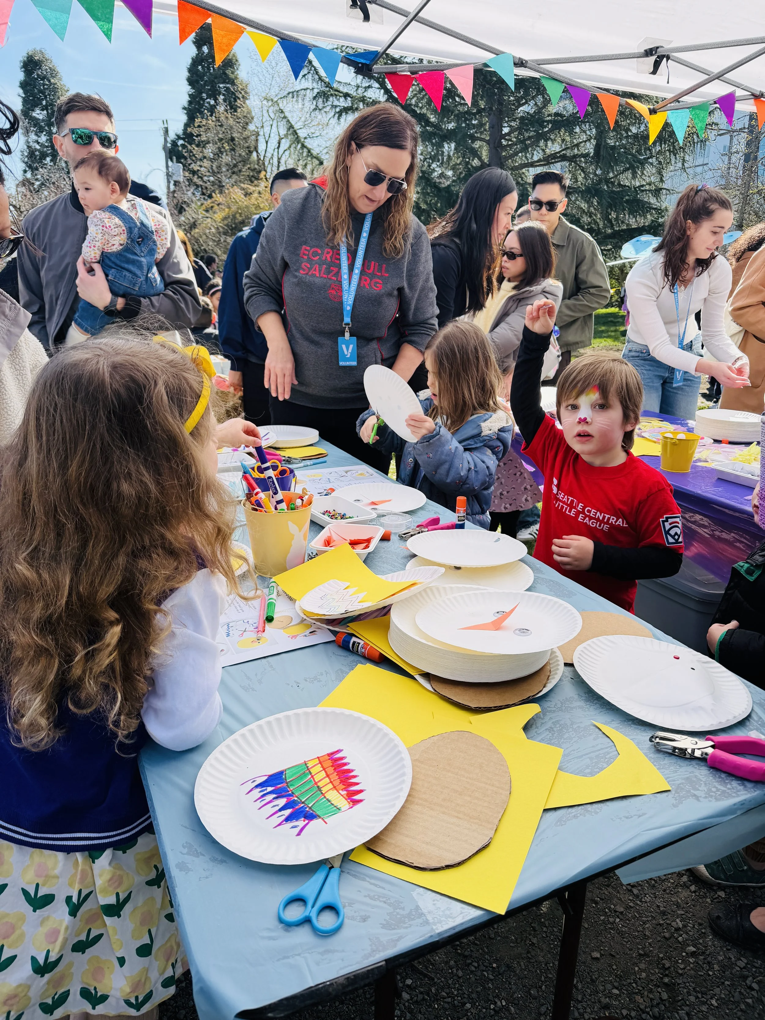 kids doing crafts at the Madison Park easter egg hunt