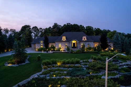 Beautiful landscaping in Castle Rock, CO featuring dynamic lighting