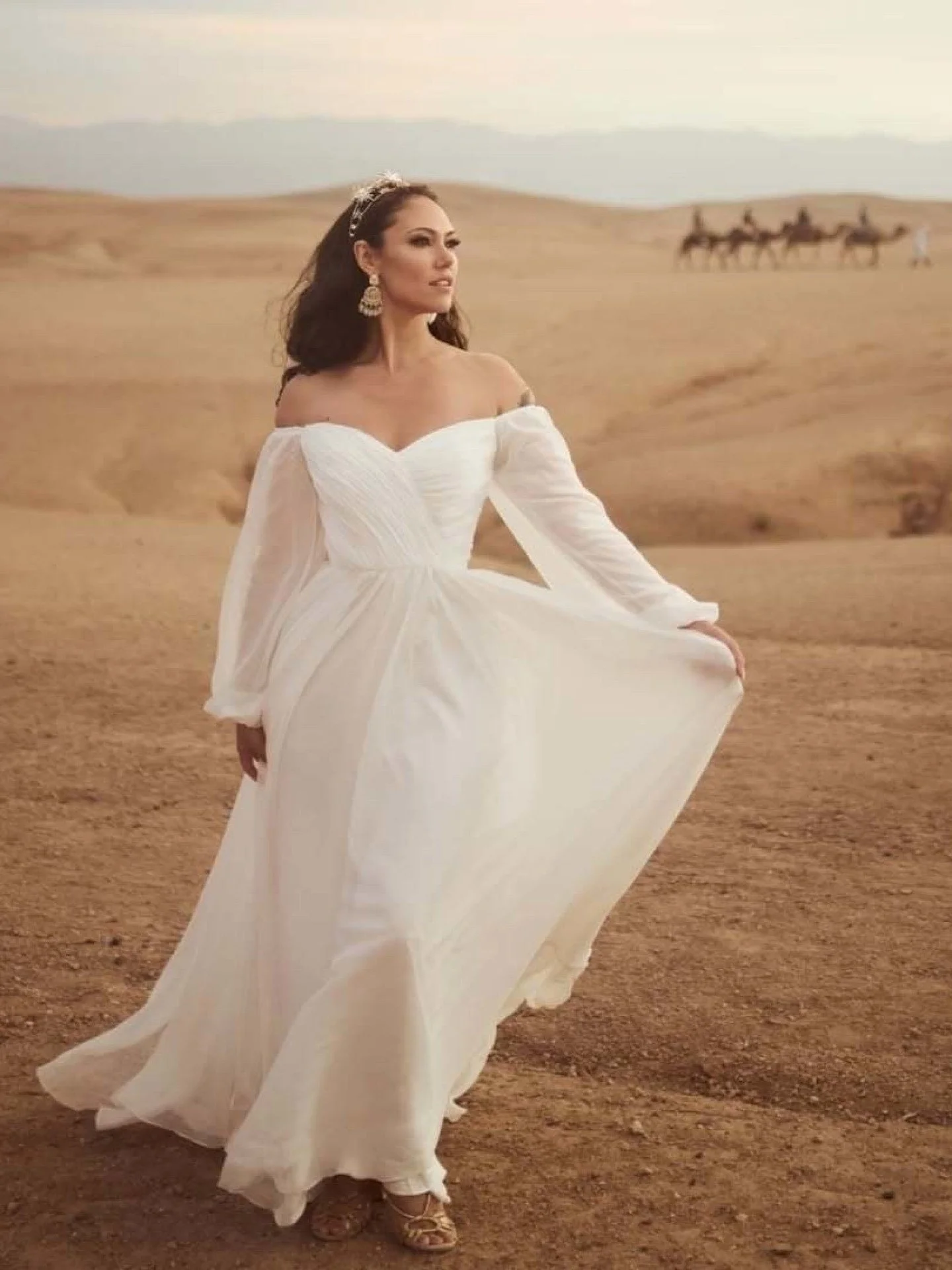 Under Moroccan skies, a vision in the setting sun.

A bespoke Bunny Rumble gown for our founder @christinarhodes.studio  created for her Celestial Beings birthday. In the heart of the desert, ethereal shimmer, fluid movement, and a silhouette worthy 