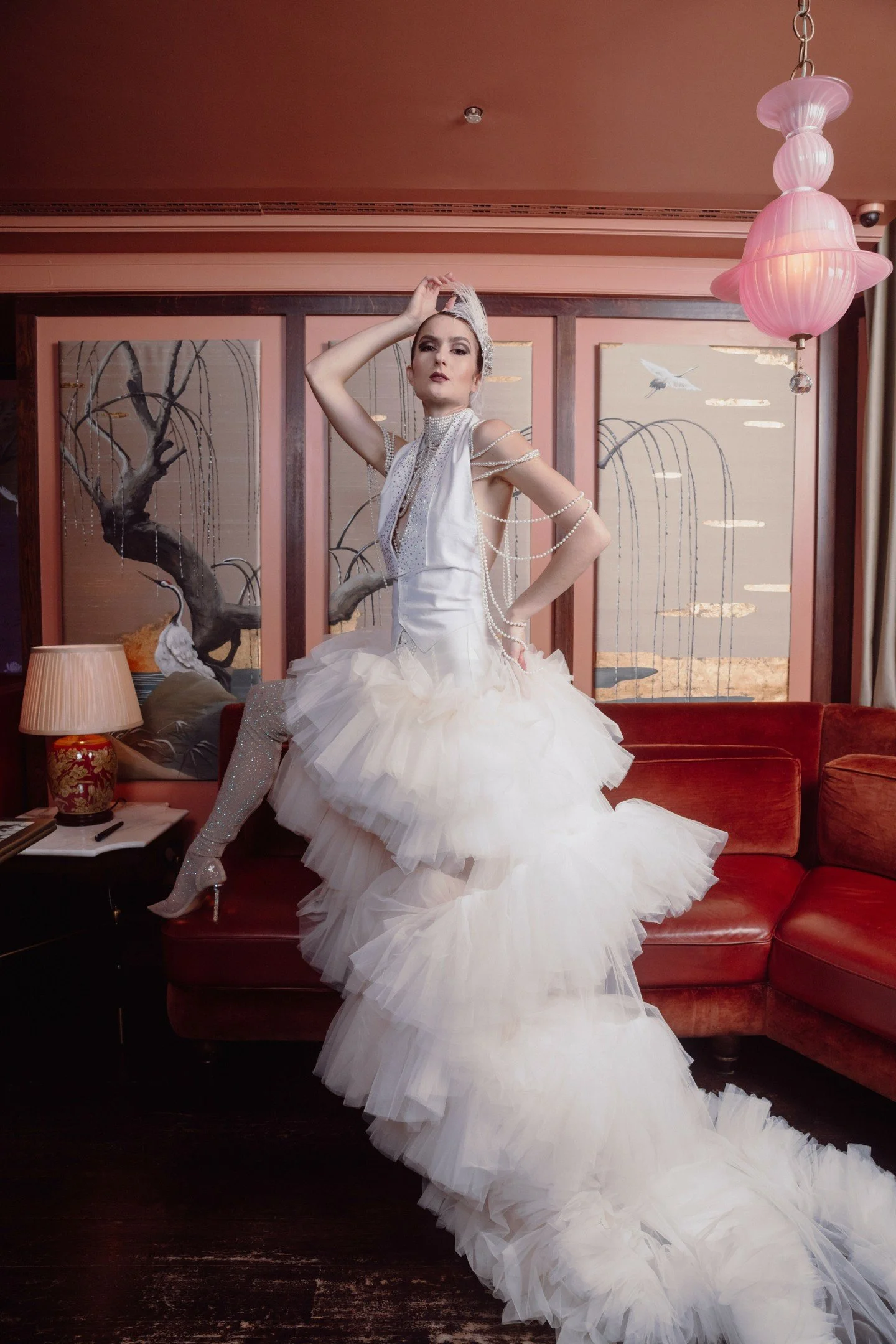 A bespoke Bunny Rumble.

Billowing white tulle, scattered pearls, and unapologetic volume. Designed for grand entrances, flashbulbs, and moments that live forever.