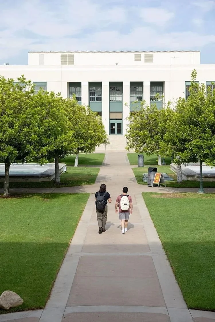 Students walking towards campus.