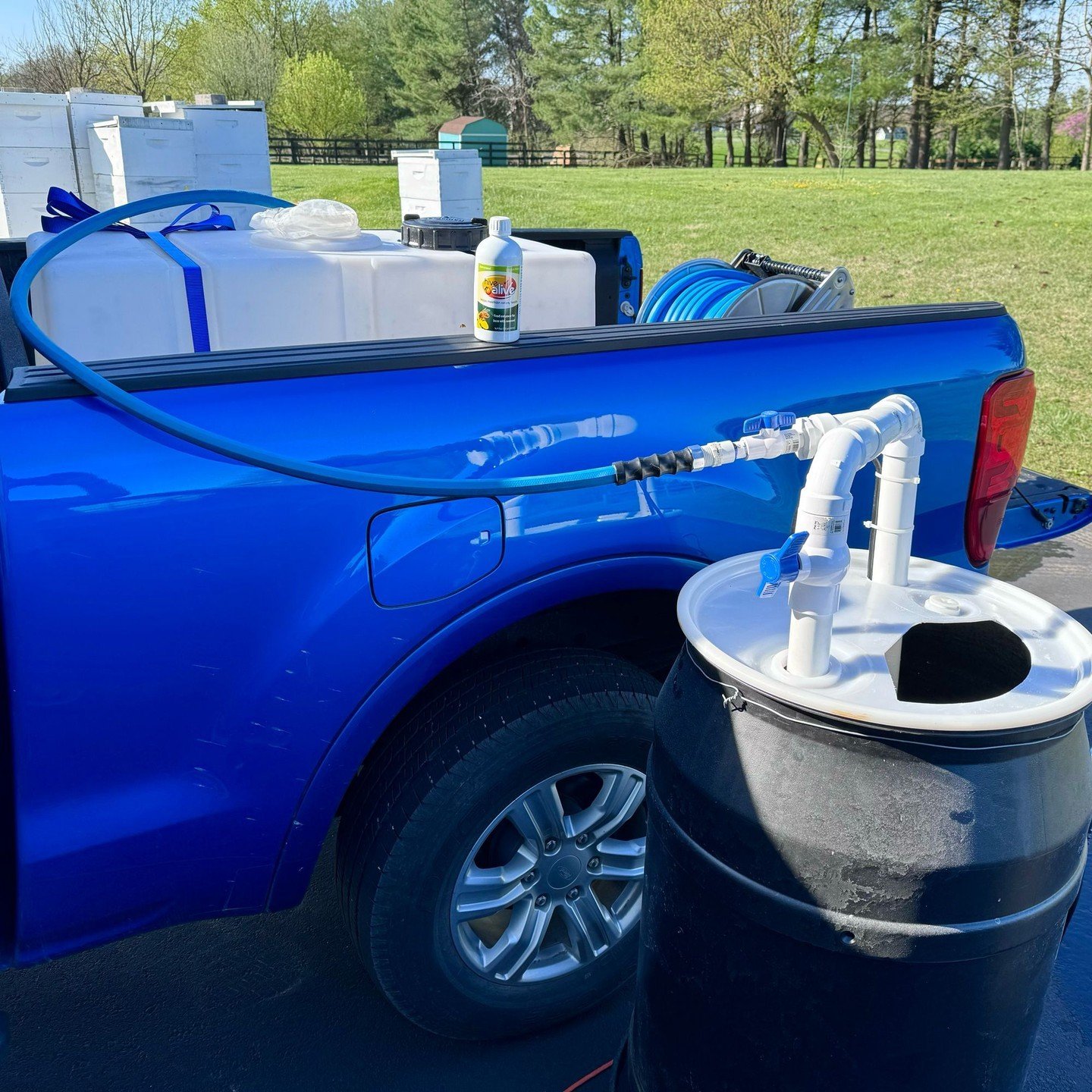 Loading up the truck with another 50 gallons of sugar syrup to feed our newest hungry colonies. New colonies need lots of extra food to raise baby bees and build up their field force. We&rsquo;ve come a long way from mixing sugar on our kitchen stove