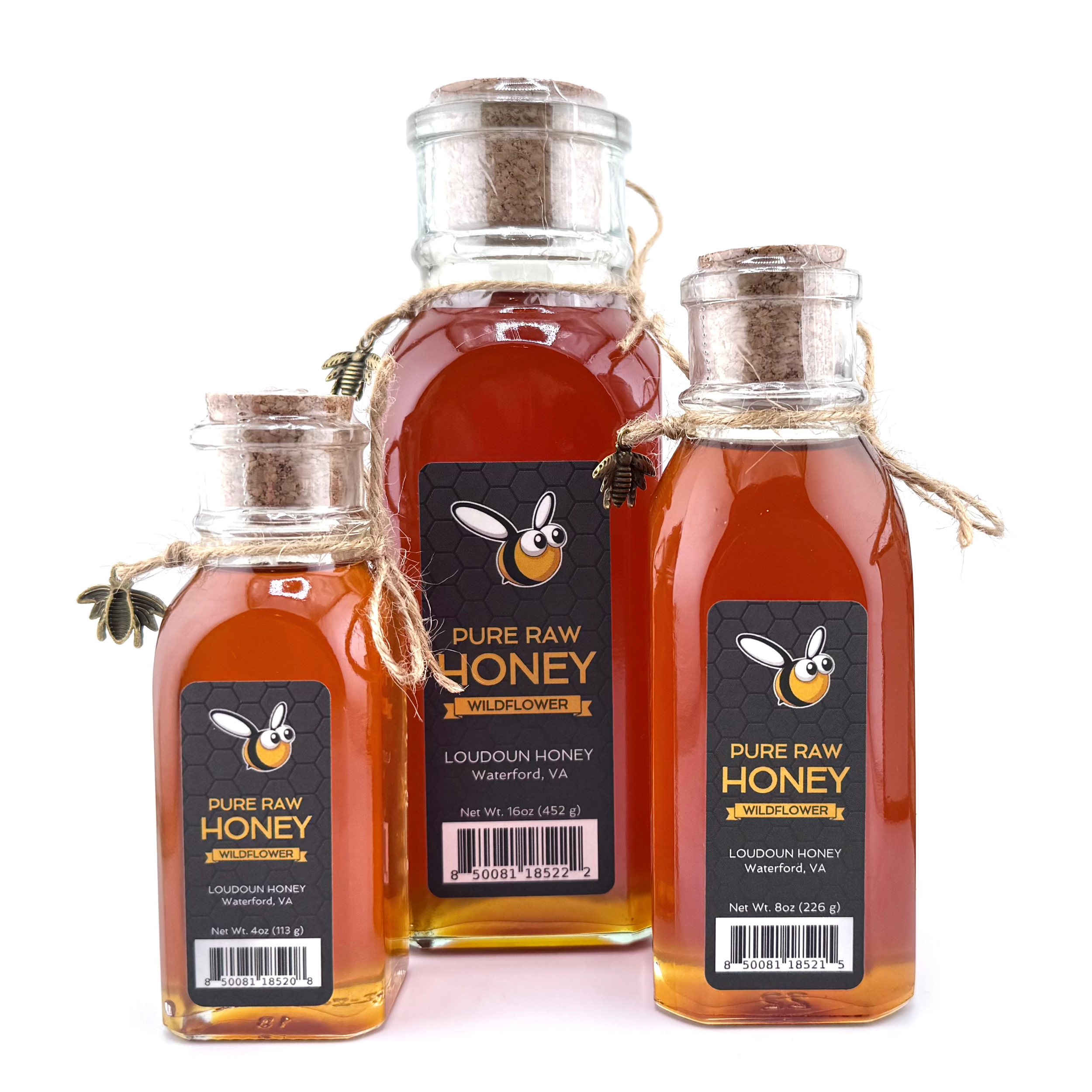Pure Raw Honey Wildflower Honey from Loudoun Honey, Waterford, VA, available in 16oz, 8oz and 4oz muth jars complete with cork and bee charm.