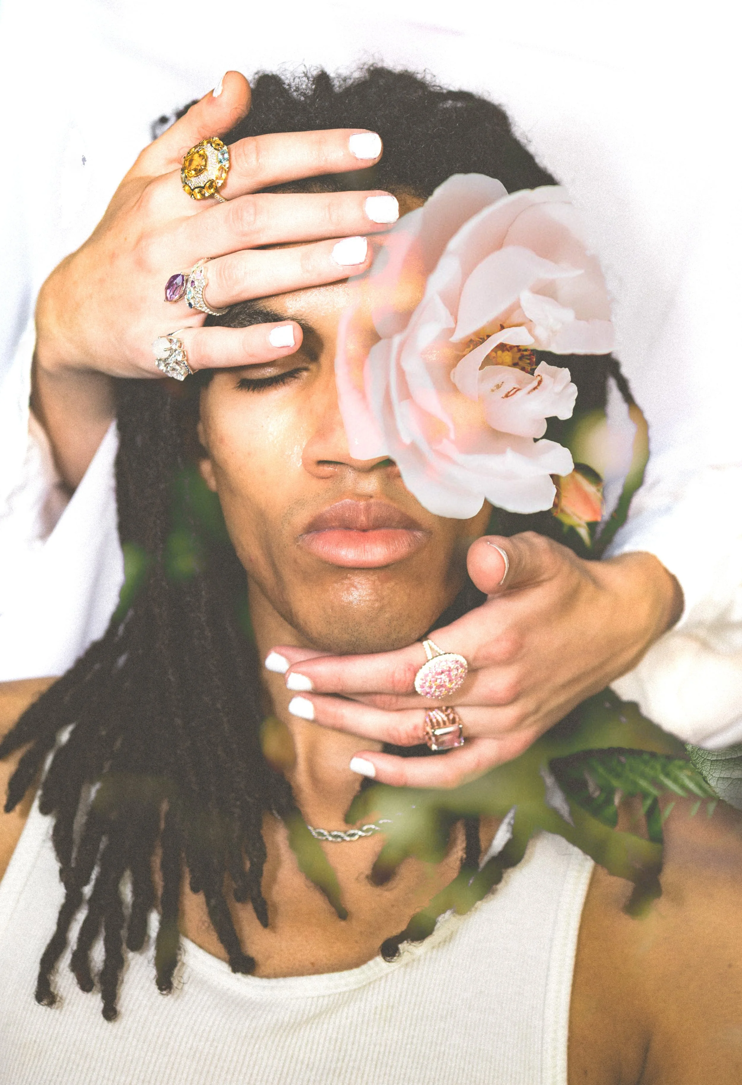 Model wearing Dreamweaver, Dreamcatcher, Nightfall in Nairobi, Arise and Dreamwatcher high jewelry rings from the In Your Dreams collection by Gerard Rene, a private NYC atelier.
