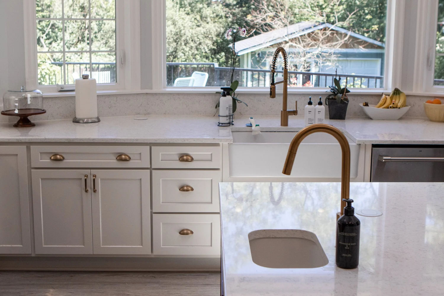 A bright remodeled kitchen with a window over the sink