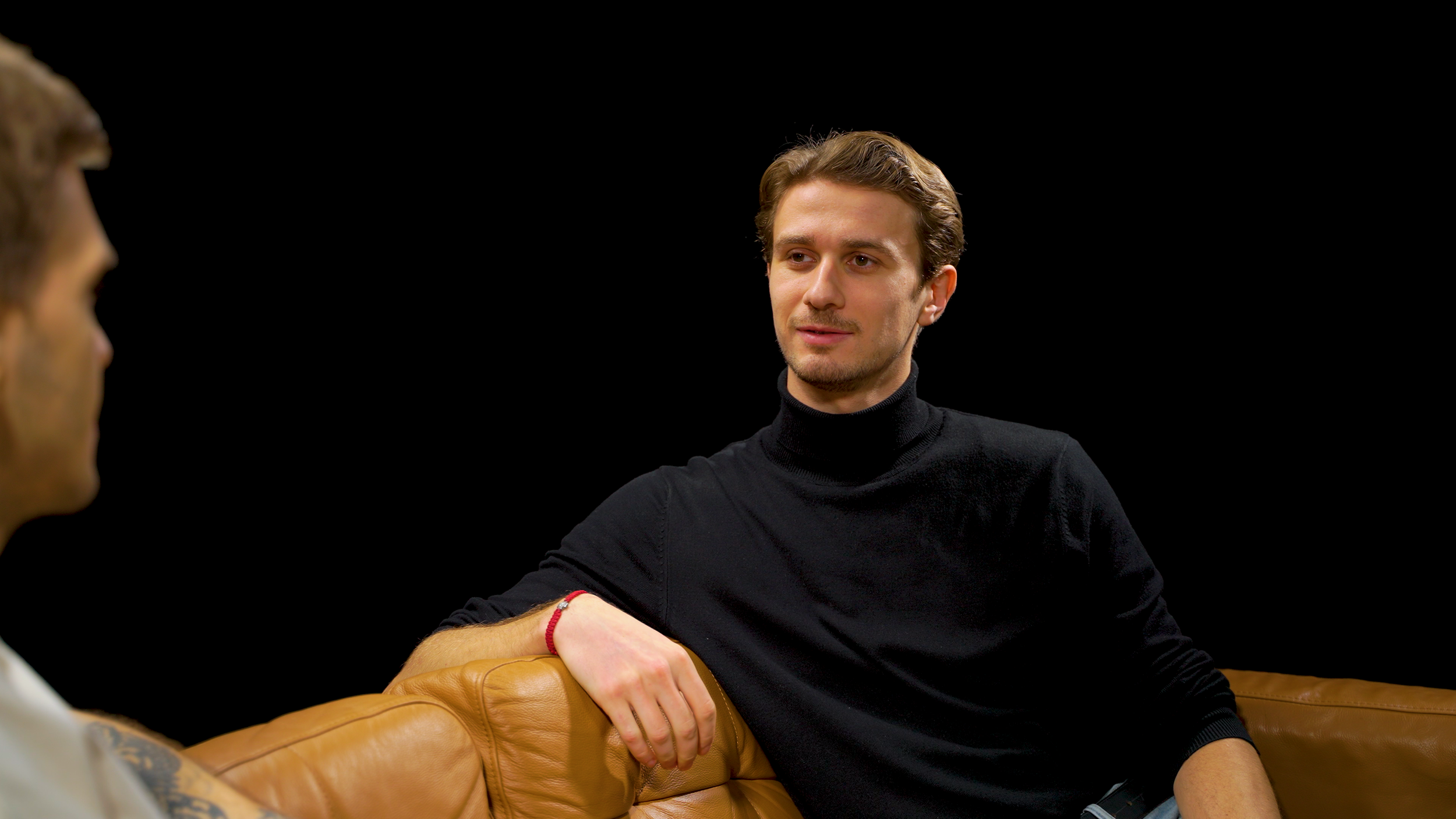 Host Blacked Out Room couch IAVA Studio.png