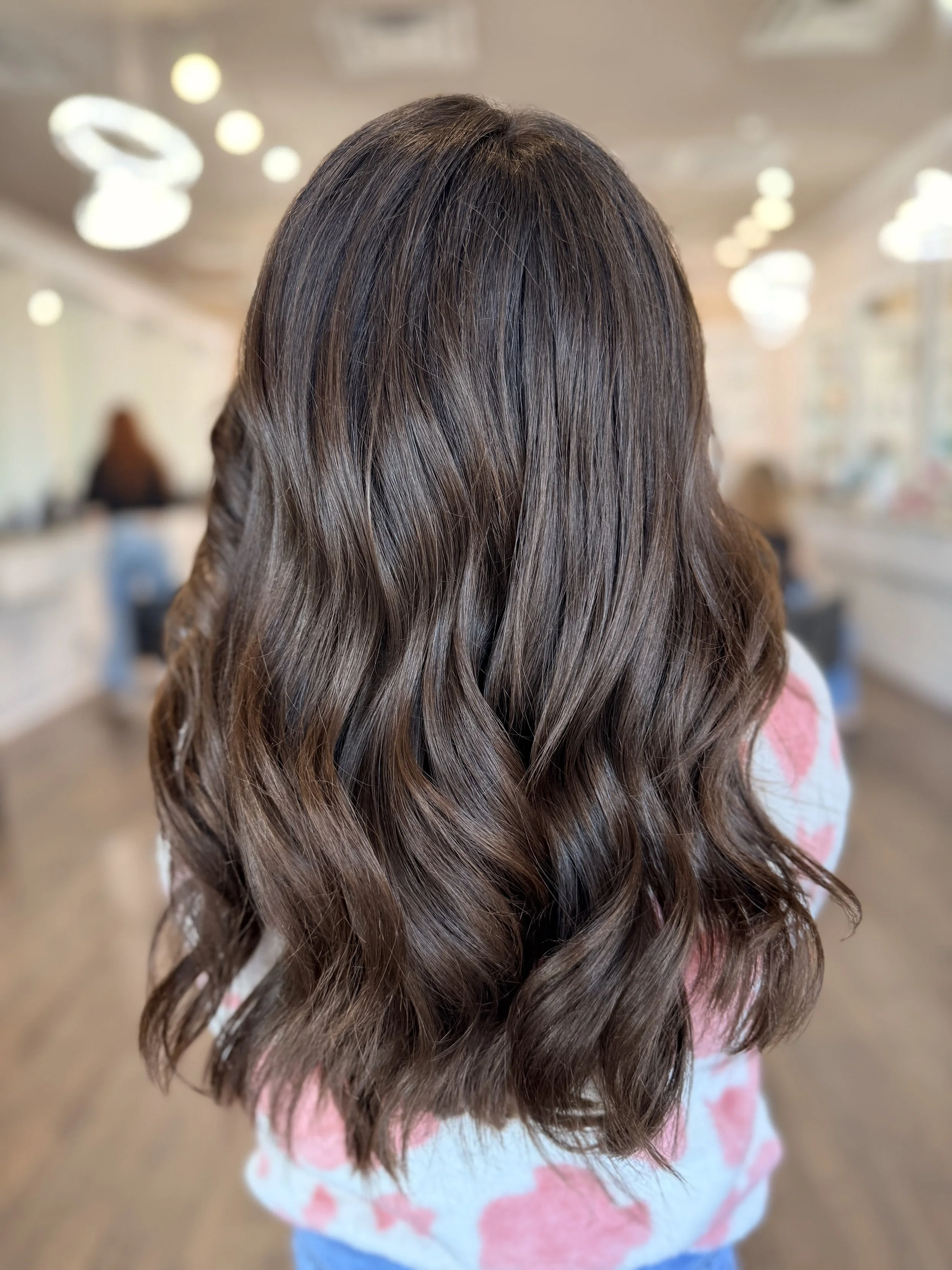 Children’s haircut for a young boy, ensuring a neat and stylish cut in a comfortable salon environment at Pani Style Hair Salon, Katy, TX.