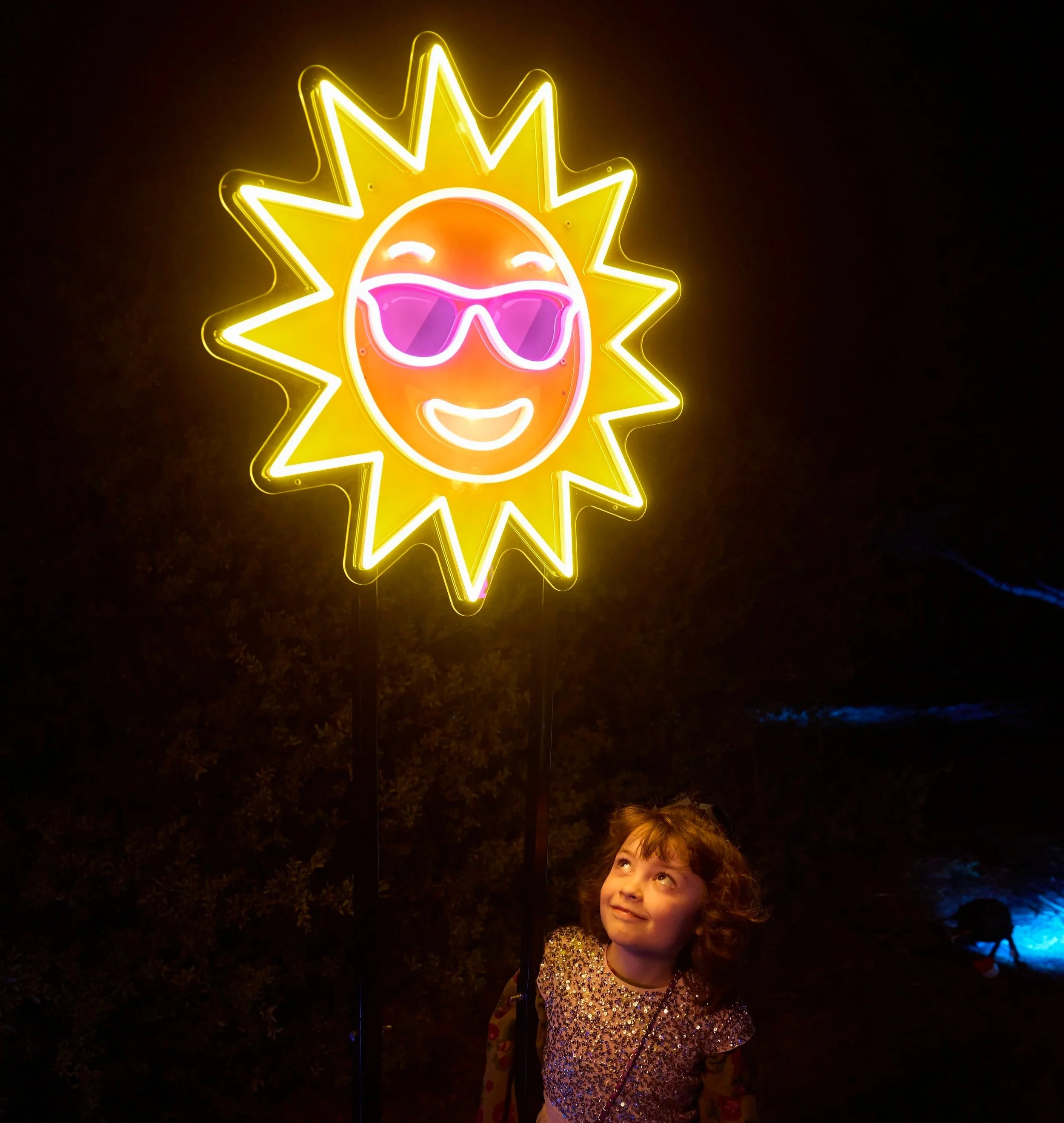 Neon Sun from Day at the Neon Beach collection - up on a metal pole to appear floating in the air.
