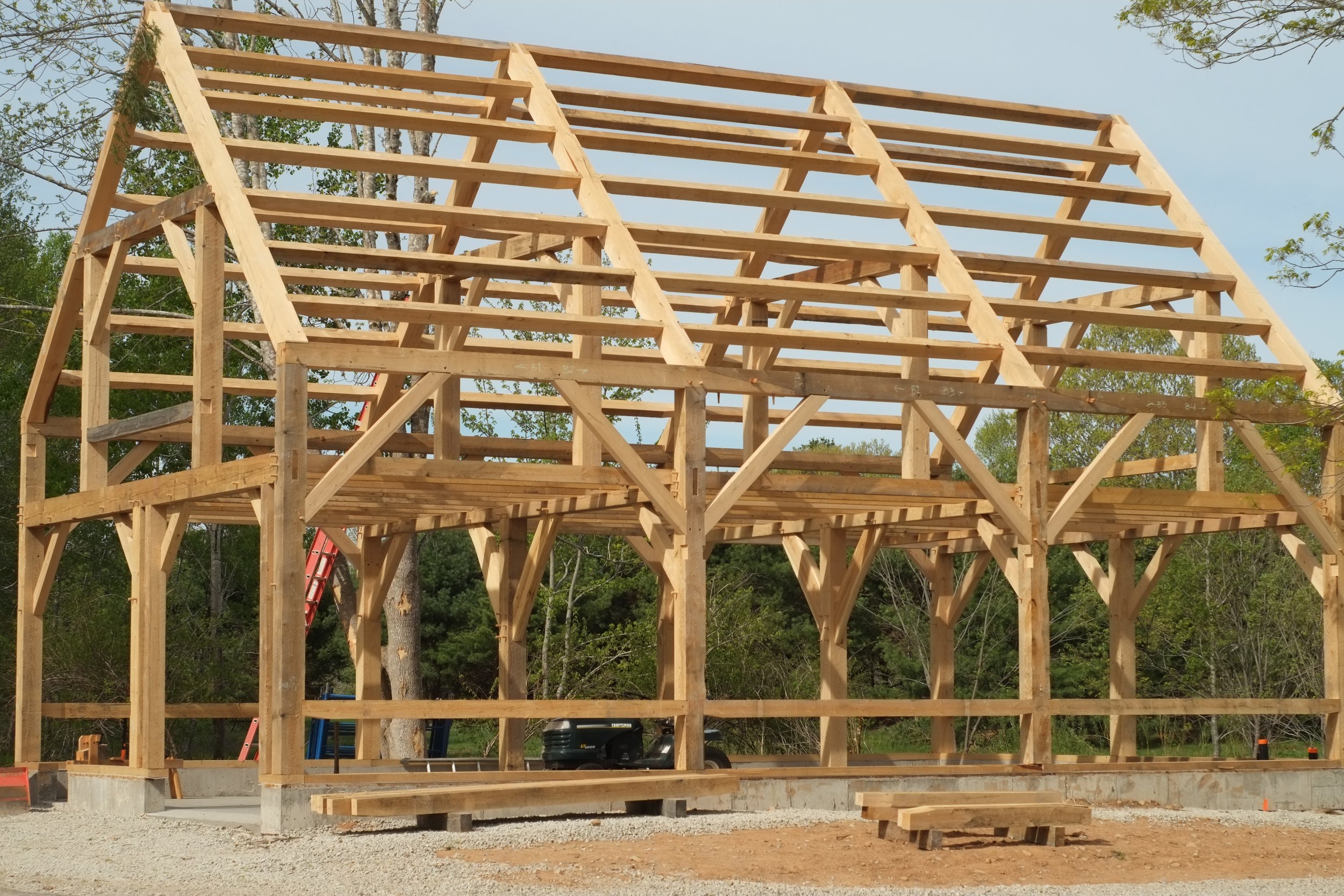 4 bents, 3 bays. The frame was laid out and cut using the square rule method and sits on rough sawn hemlock sill plates.
