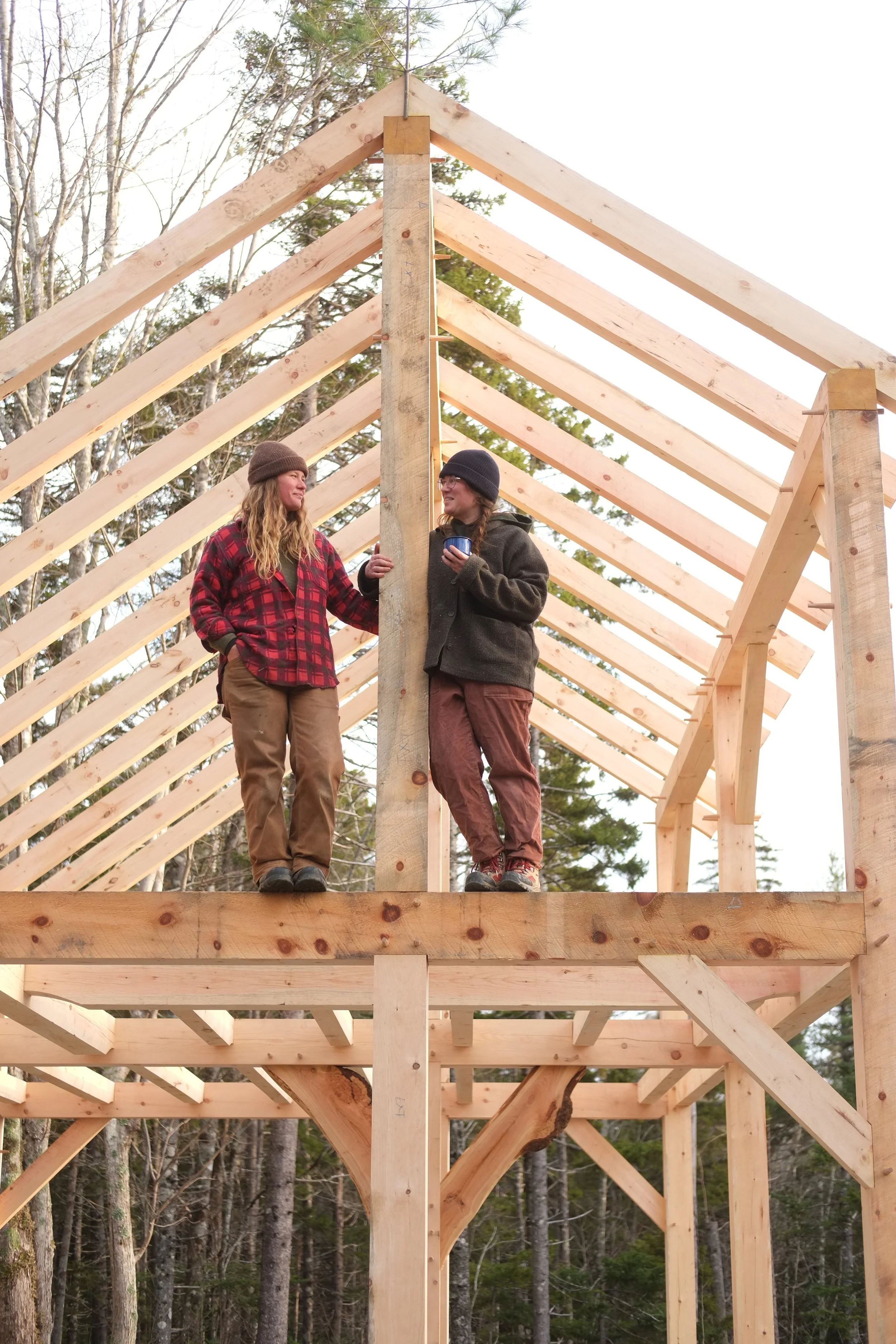 Some very happy owners sharing a drink and a few words of gratitude with their new frame!