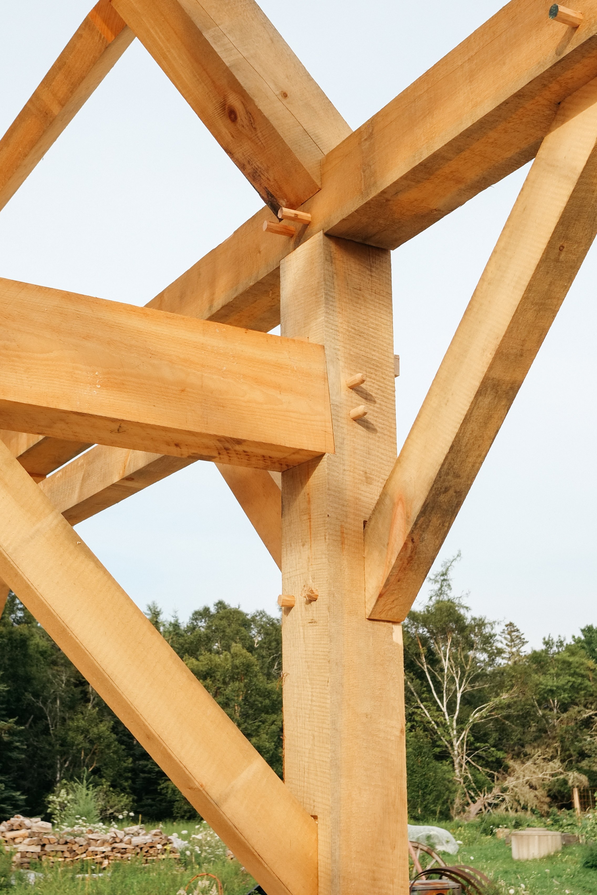 Joinery at post. Wedged half dovetail thru tenon holds it all together.