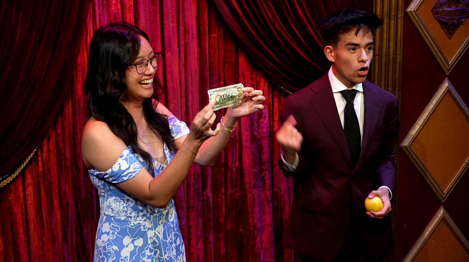 Jacob Martinez performing strolling close-up magic and mentalism for a guest at a private event in Los Angeles