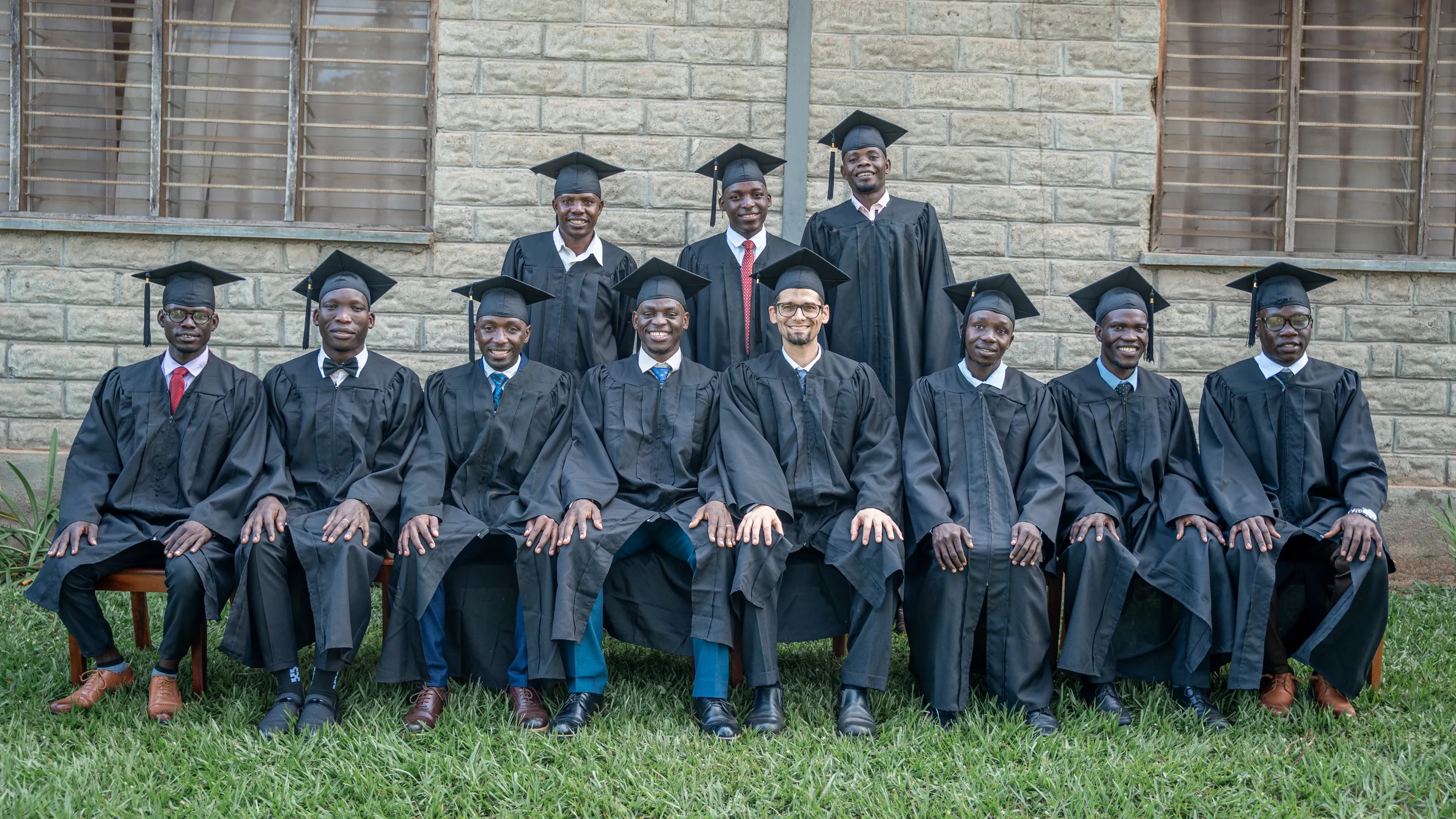 Some of the graduands with a faculty member