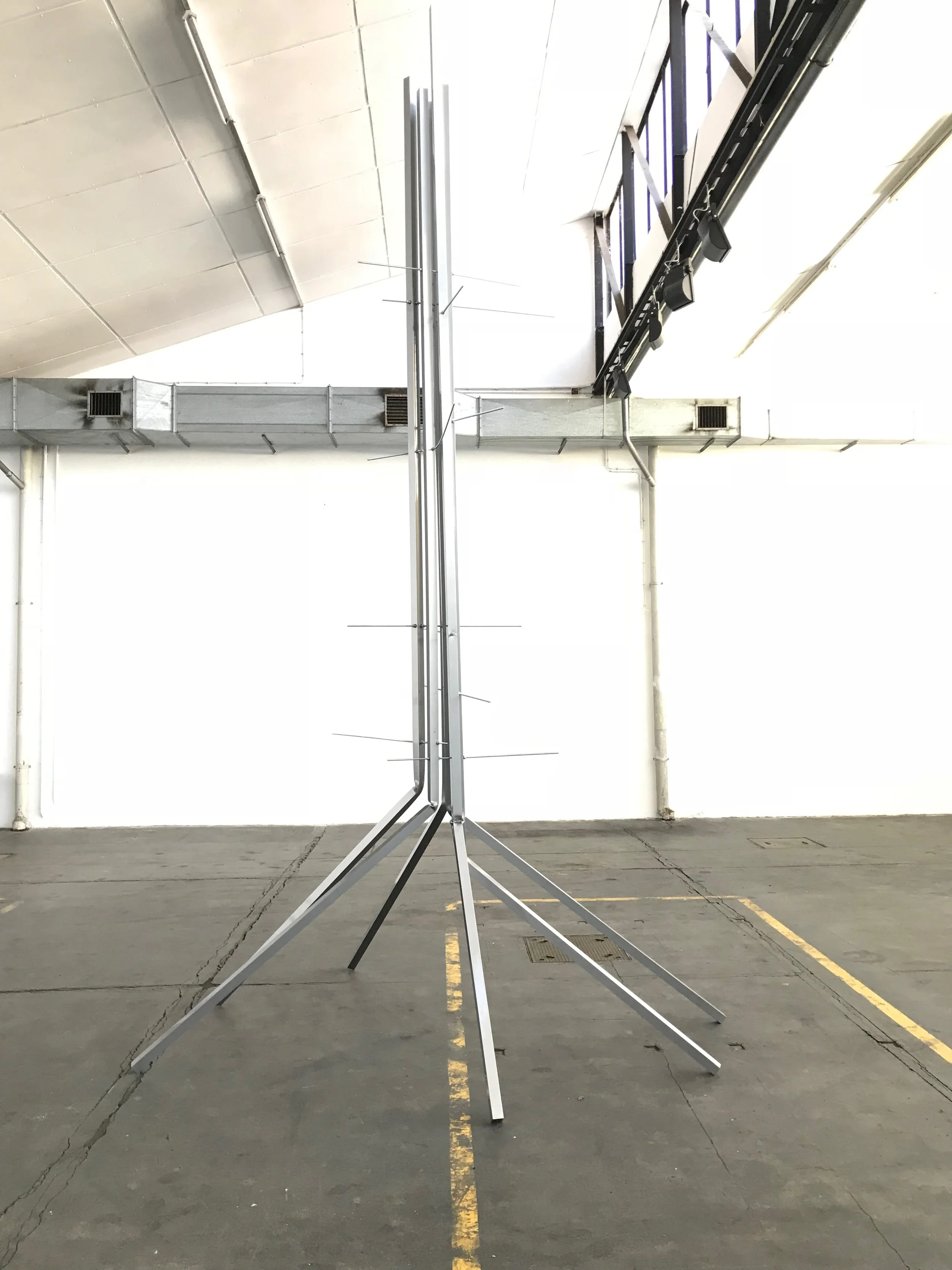 Lightning bolt, 2018  
Powder coated aluminium, threaded rod  
568.5 x 330 x 275 cm