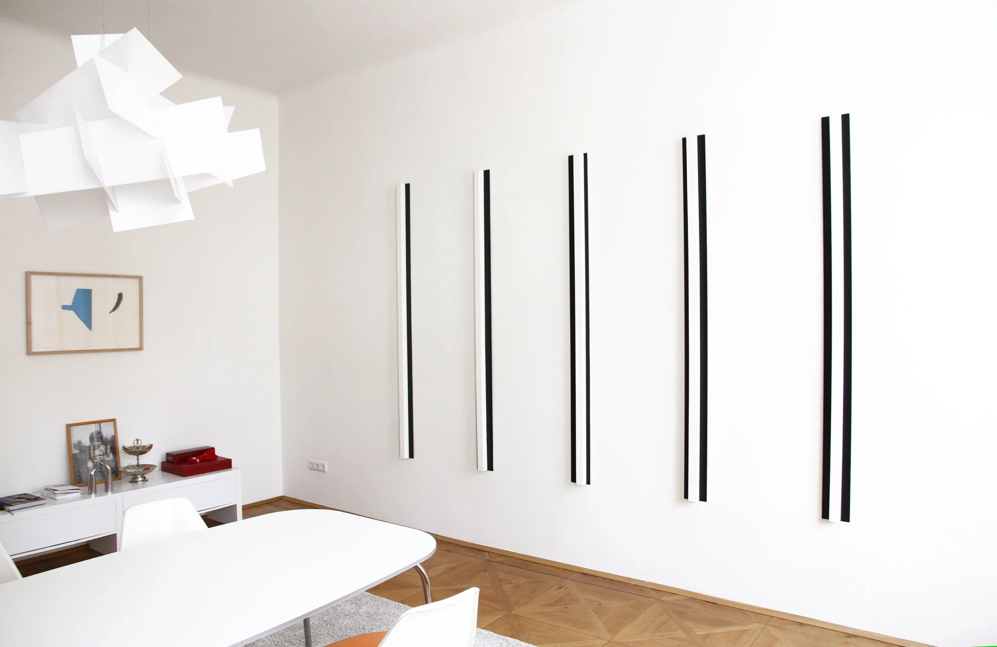 31 days of rain, 2006  
Enamel paint on wood and aluminium  
In 5-parts, each 200 x 13 x 5 cm