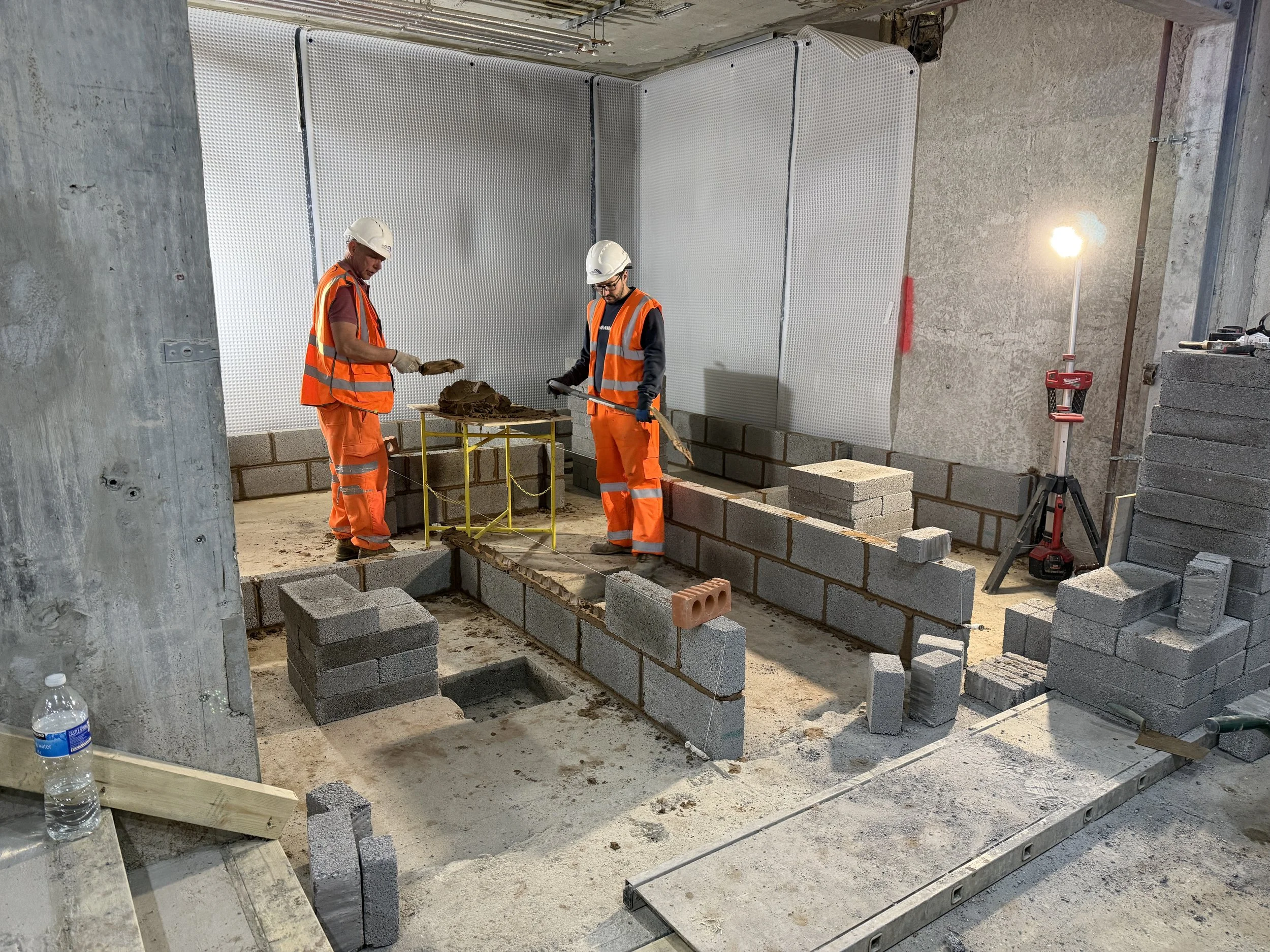 Blockwork construction at Holland Park W11 with full PPE and specialist site equipment