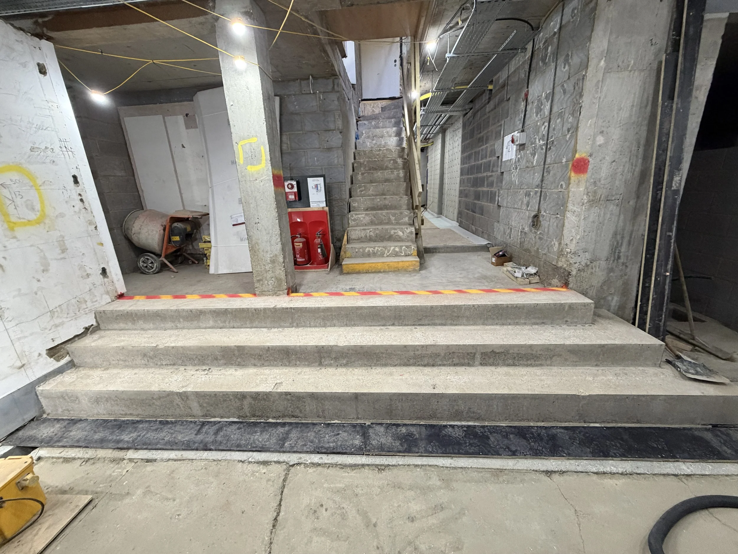 Wall chasing for coordinated building services within the Holland Park W11 listed property.