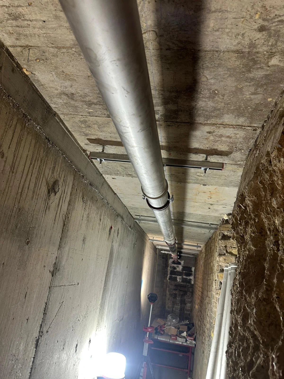 Precision core drilling undertaken from scaffold access at the listed Holland Park W11 residence.