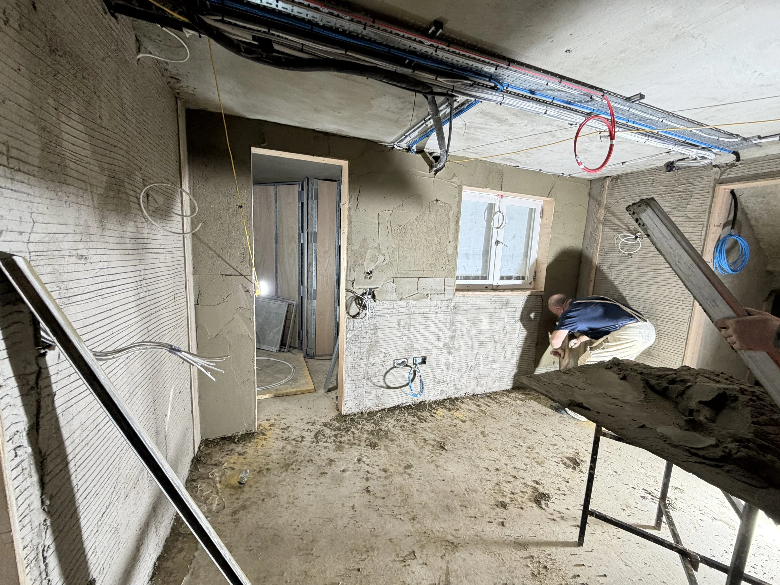 Site team working from scaffold access at a high-end listed residential refurbishment in Holland Park W11, Central London.