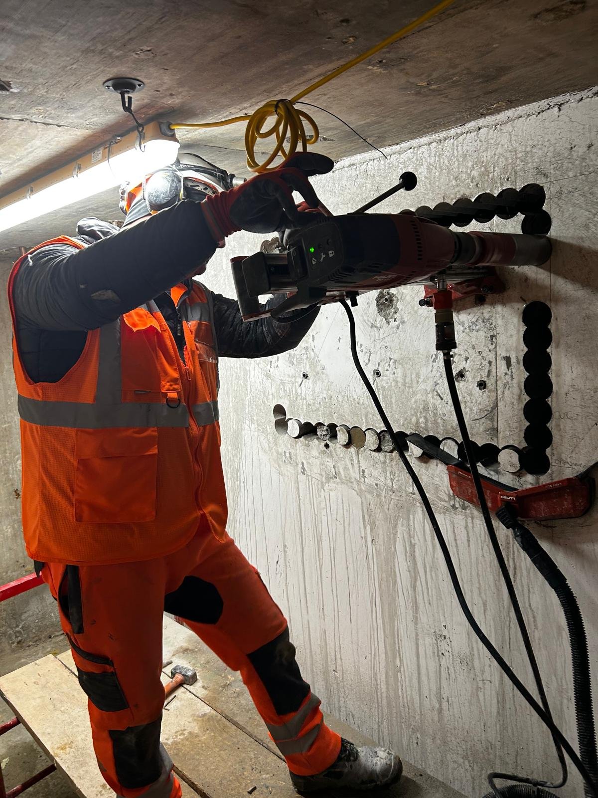 Precision stitch drilling to form a controlled concrete opening at Holland Park W11.