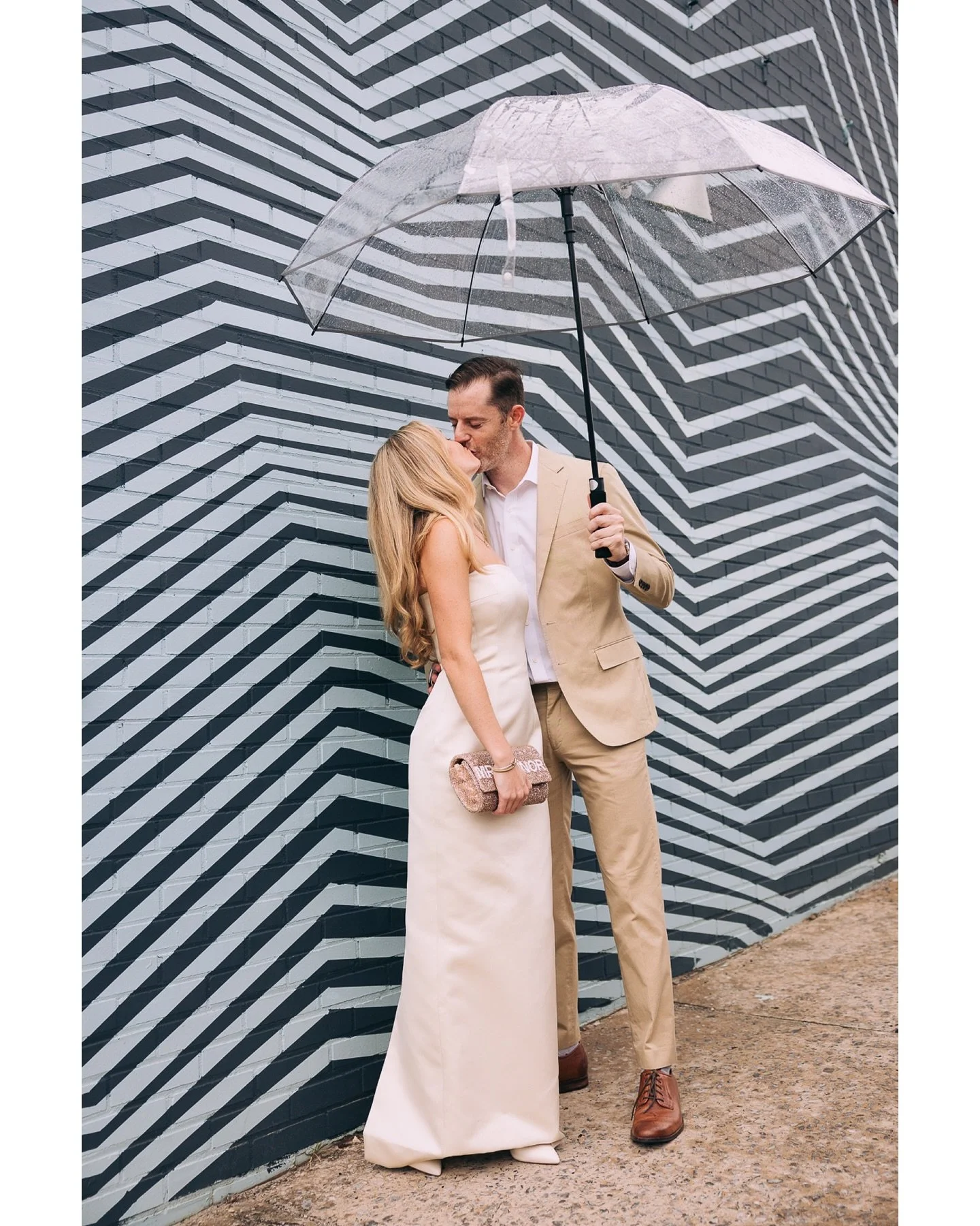 E + J : So glad we fit in some quick portraits before their welcome @culturaavl. Love trying stuff out with people who can ignore the rain and absolutely bring it. 🔥🔥🔥

#engagementsession #ashevillewedding #destinationwedding #asheville #asheville