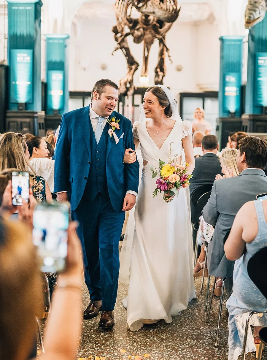 Intimate couple moment bright colourful wedding bouquet