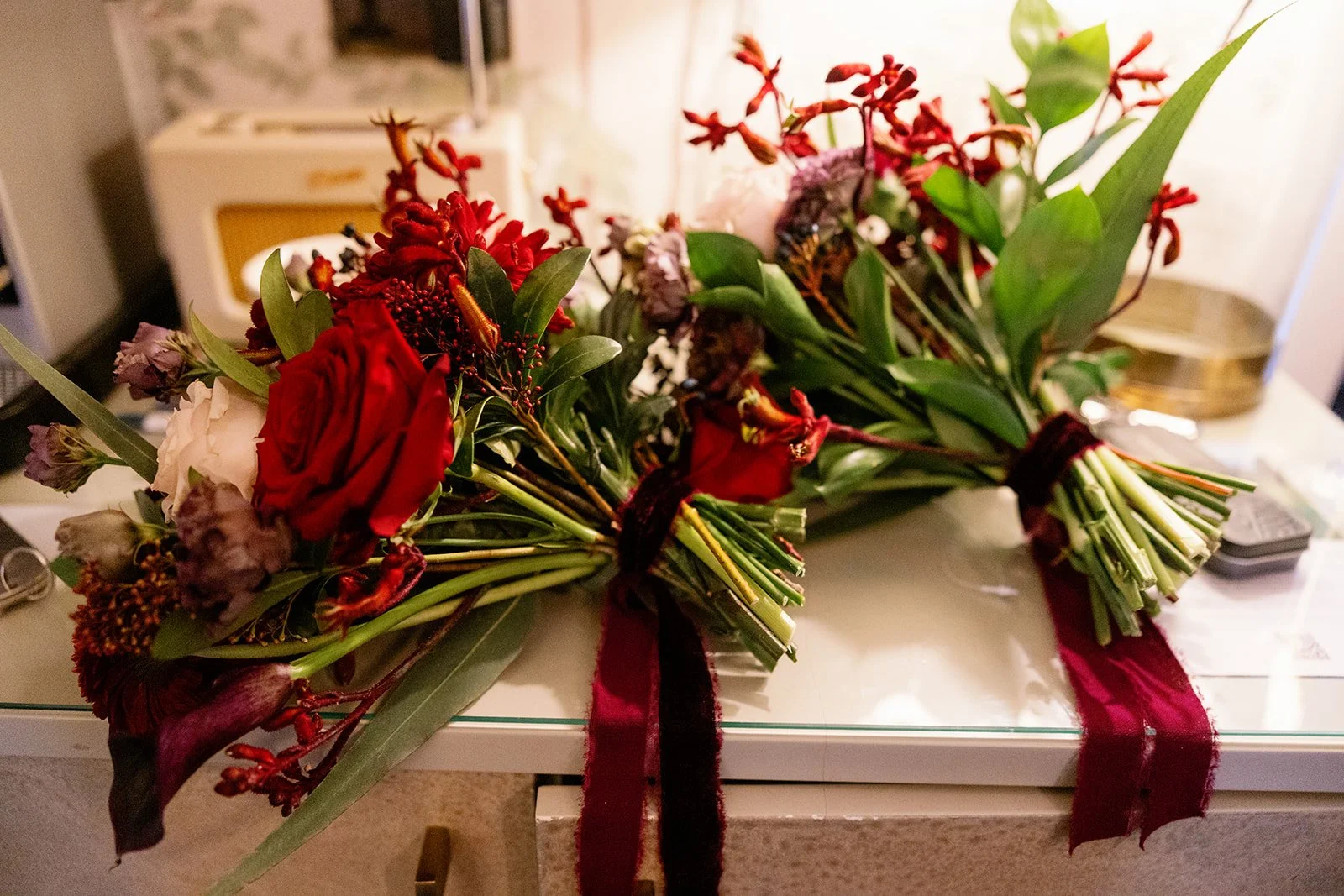 Moody red bridesmaid bouquets