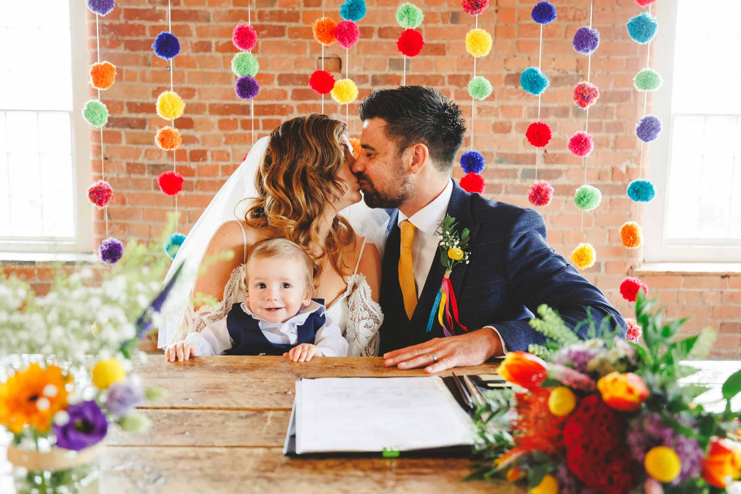 Wedding ceremony colourful flower backdrop