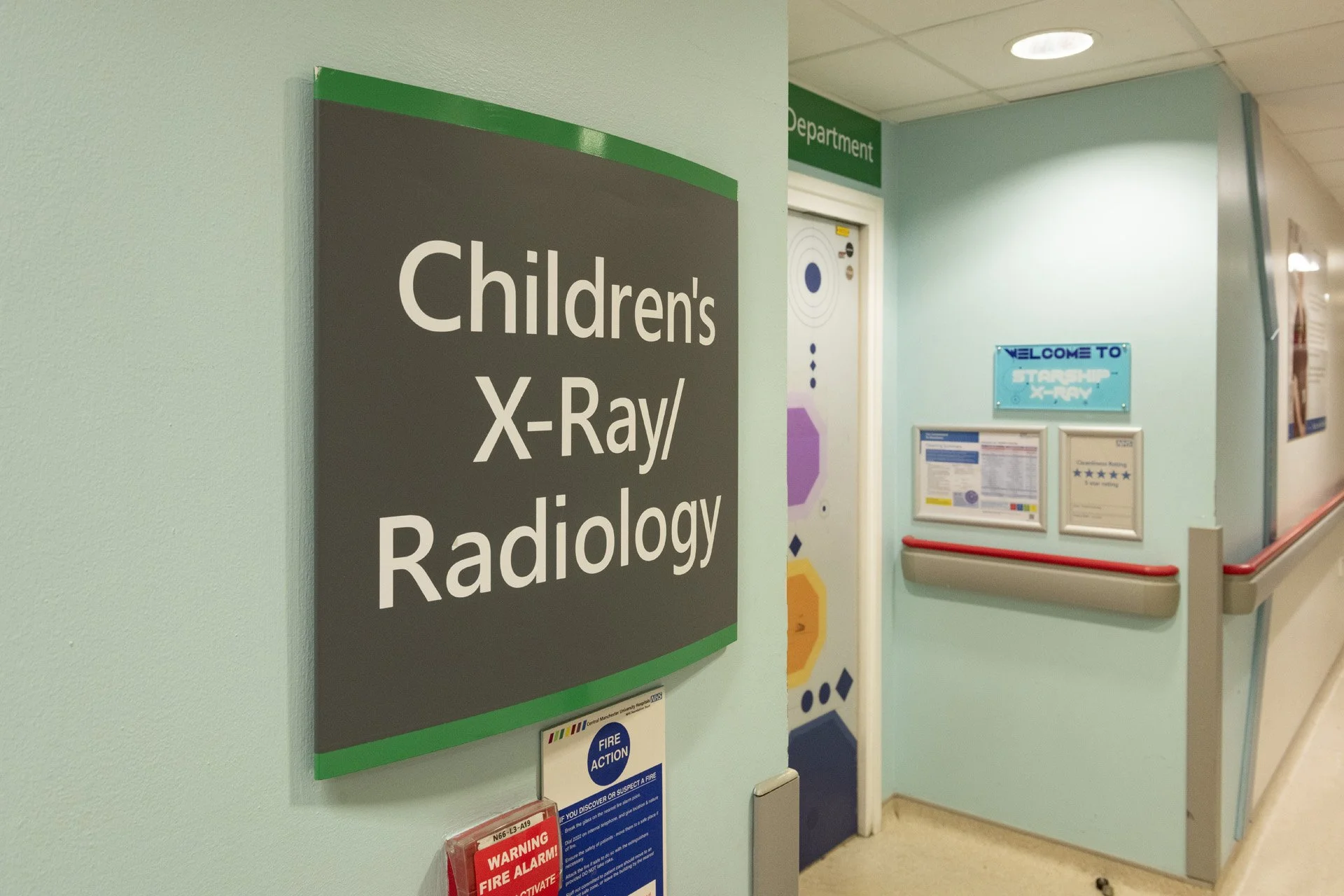 Signage in hospital that says Children's X-Ray. Specialist agency for NHS charities
