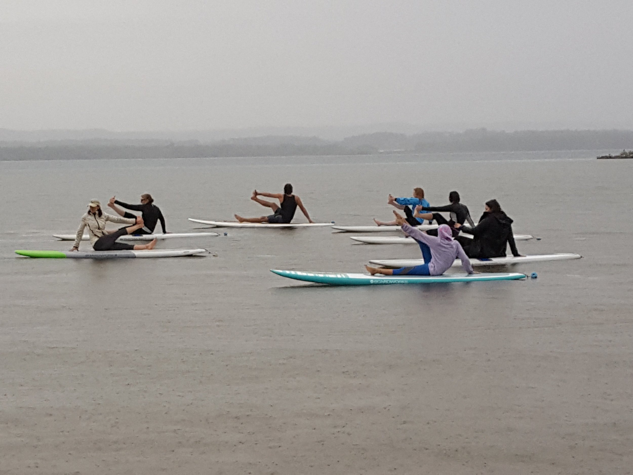 Rainy SUP seated twist.jpg