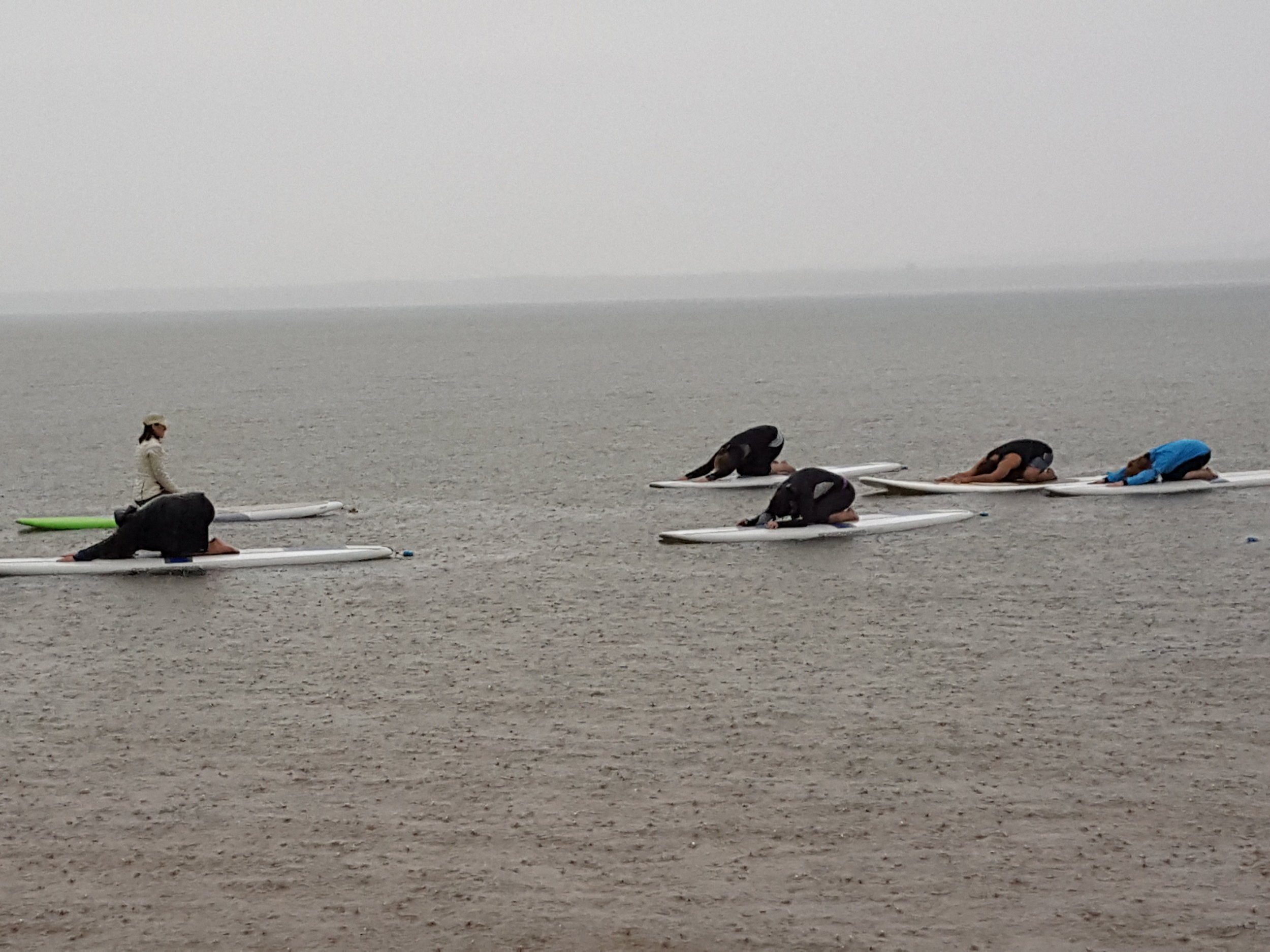 Rainy SUP childs pose.jpg