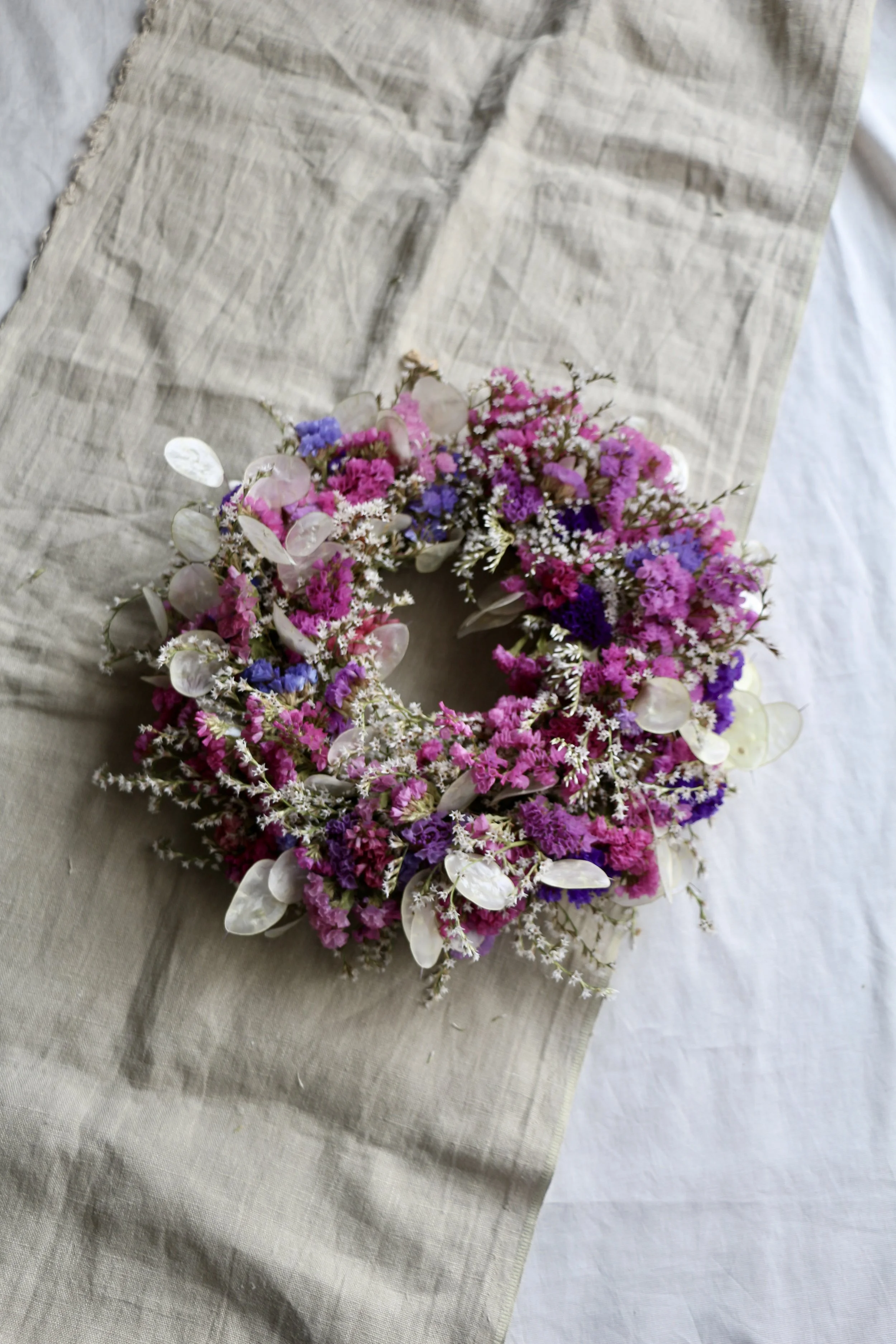 purple and pink dried flower wreath