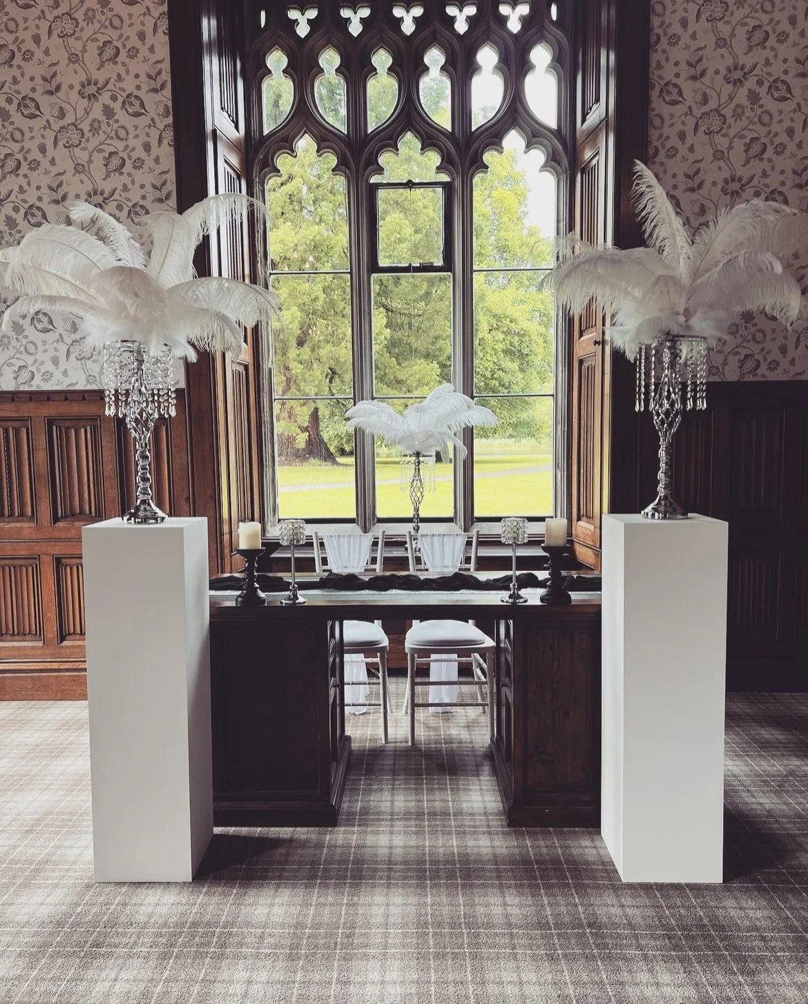 White display plinths with wedding venue styling