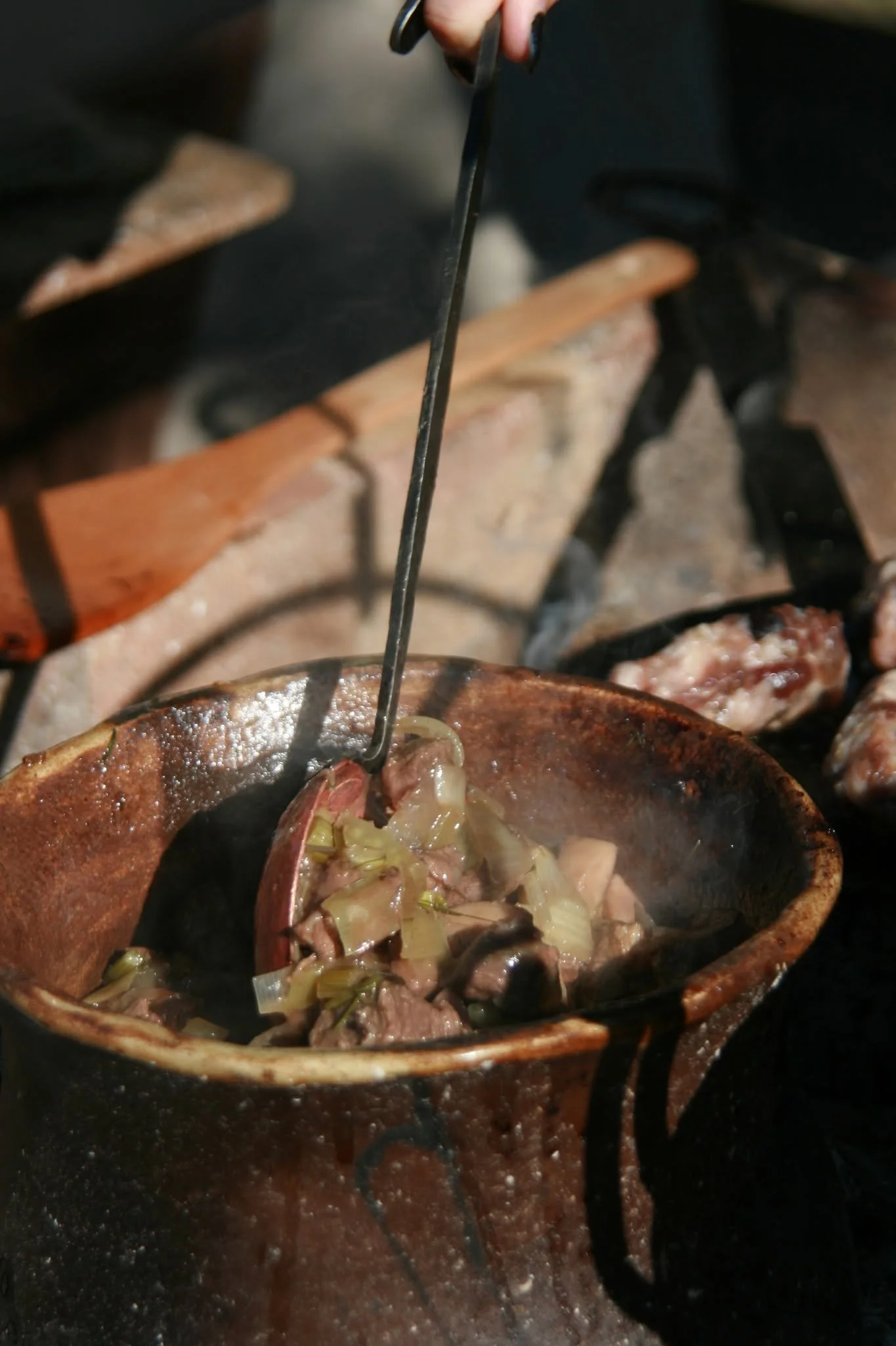 Venison stew in a ceramic pot I made