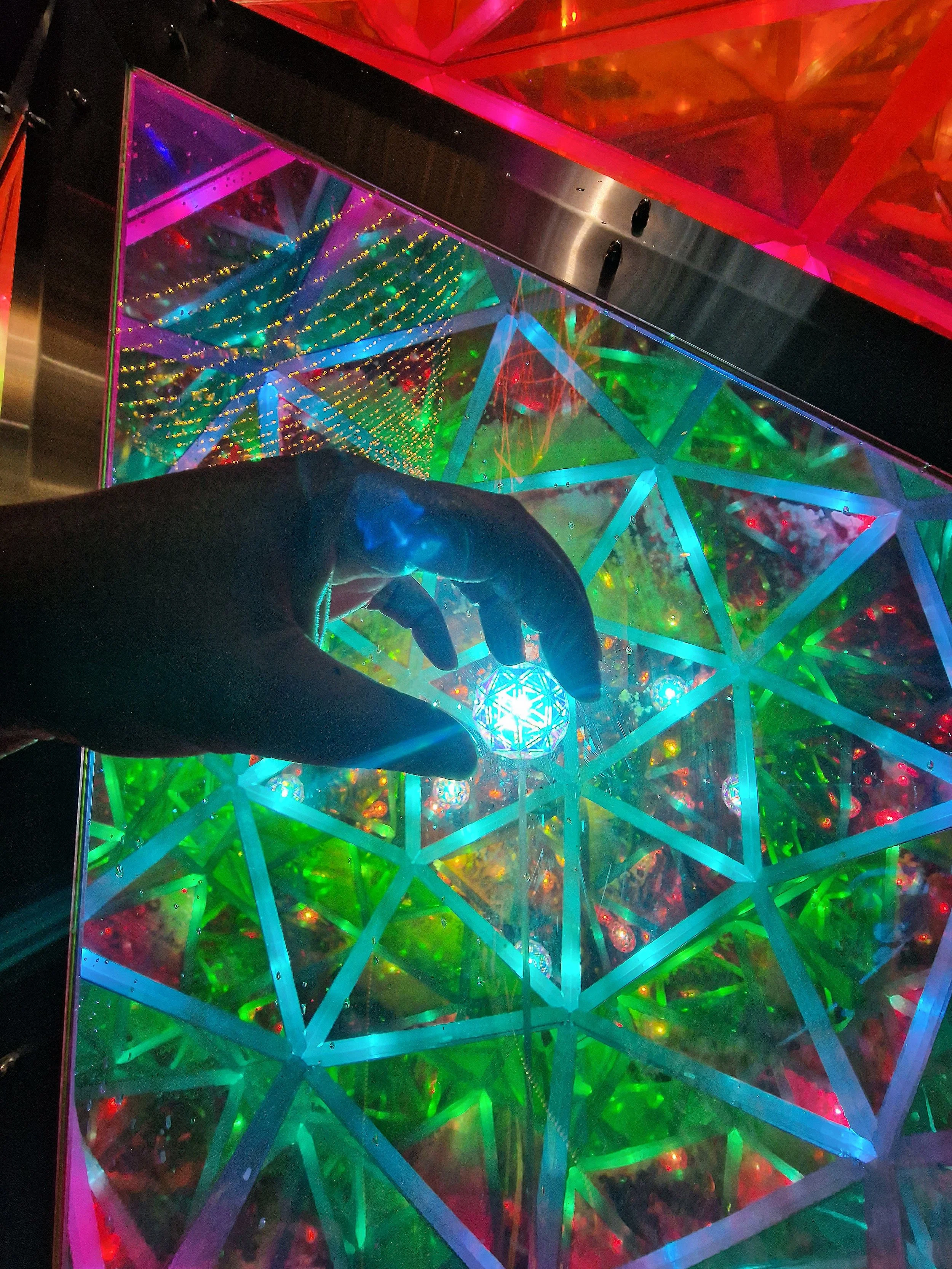 Queen August taking the glowing ball