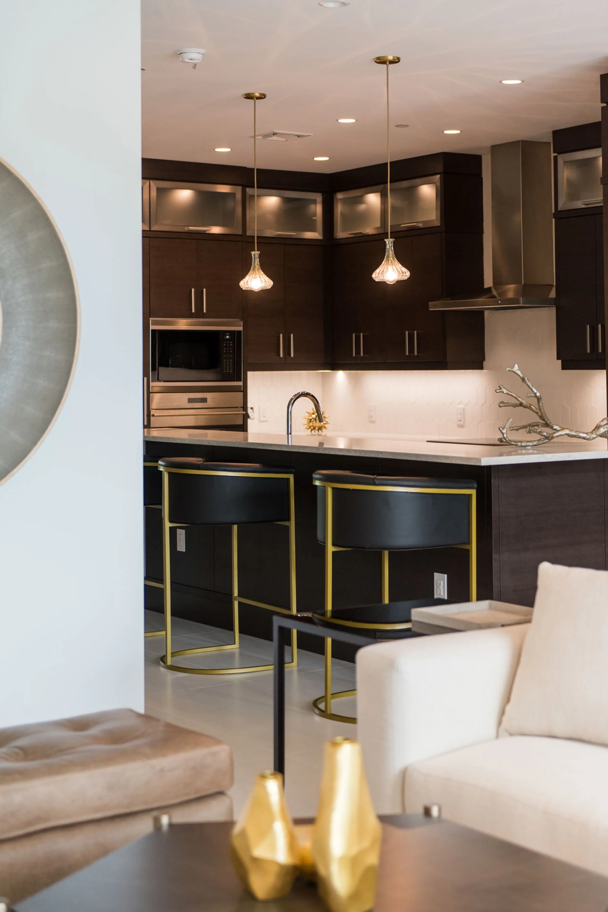 Calming living areas have been created from a sophisticated blend of traditional and contemporary elements. A soft monochromatic palette with darker contrasting hues adds visual depth and textures provide the warmth and comfort. Luxury, Simplified.