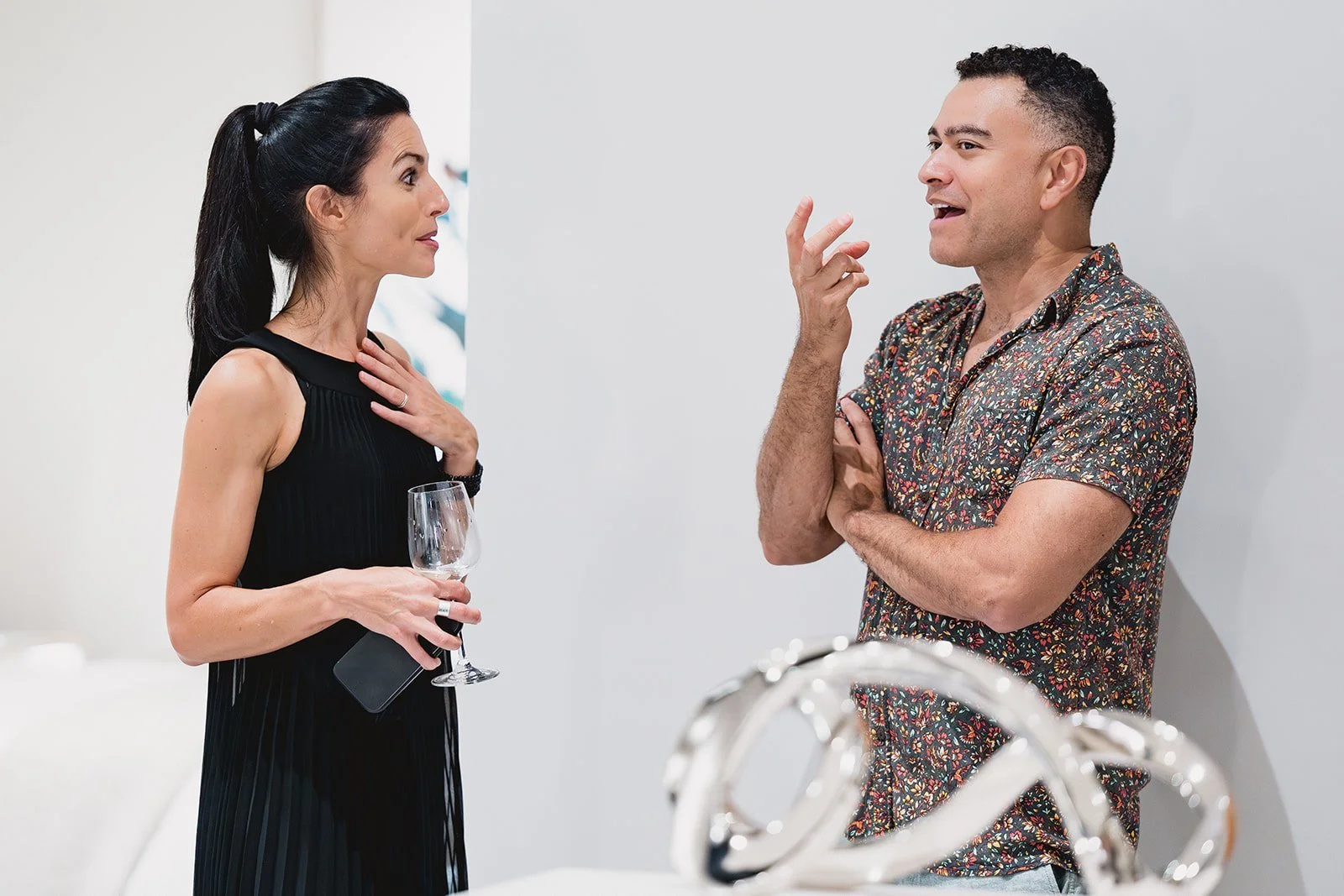 Janine Every and guest at IDG's exhibition "Spatial Dialogue" during Cayman Art Week 2026.