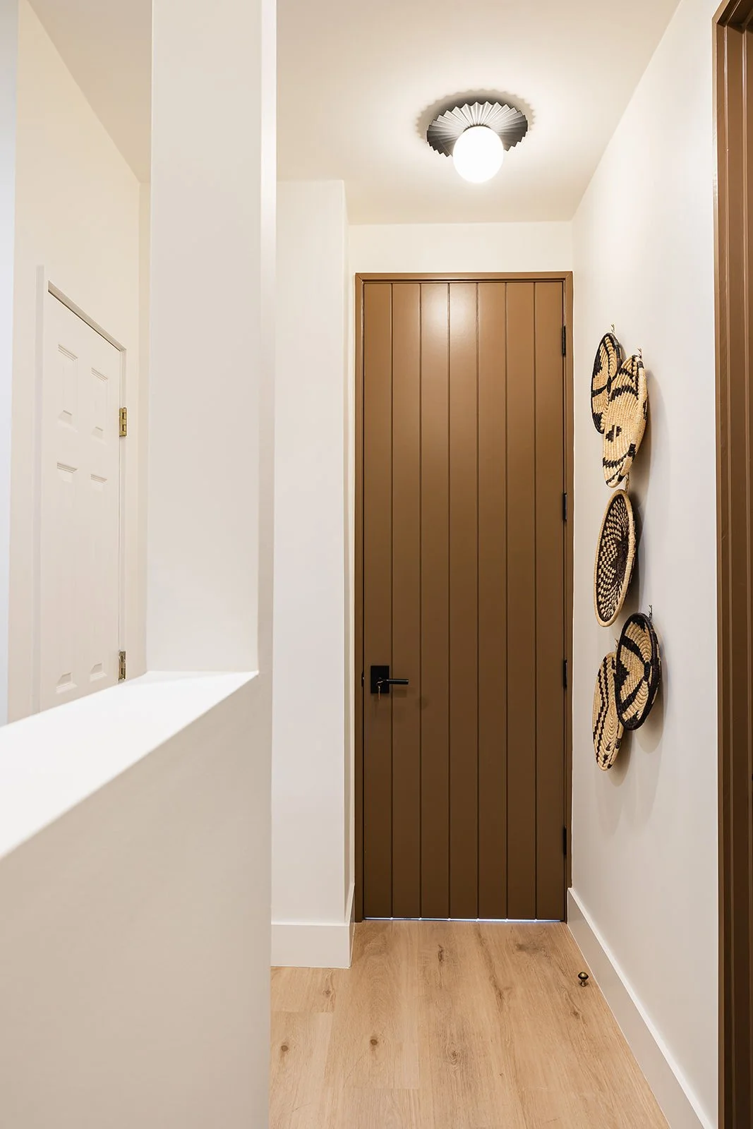 A warm, Bohemian-inspired sanctuary where refined living and everyday function coexist in perfect balance. Natural textures, curated details, and a serene, cohesive palette elevate each moment, infusing the home with effortless comfort and style.