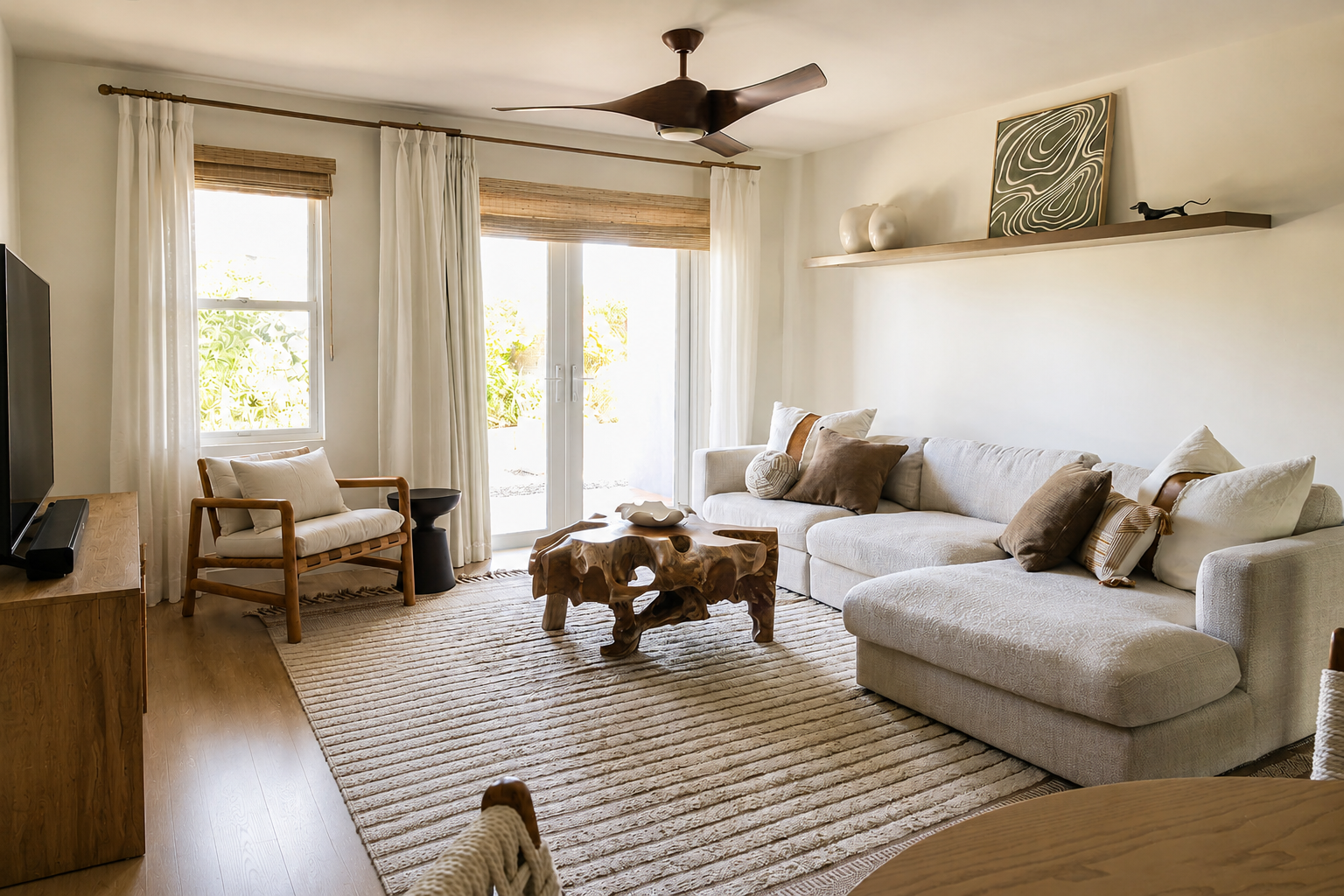 A warm, Bohemian-inspired sanctuary where refined living and everyday function coexist in perfect balance. Natural textures, curated details, and a serene, cohesive palette elevate each moment, infusing the home with effortless comfort and style.