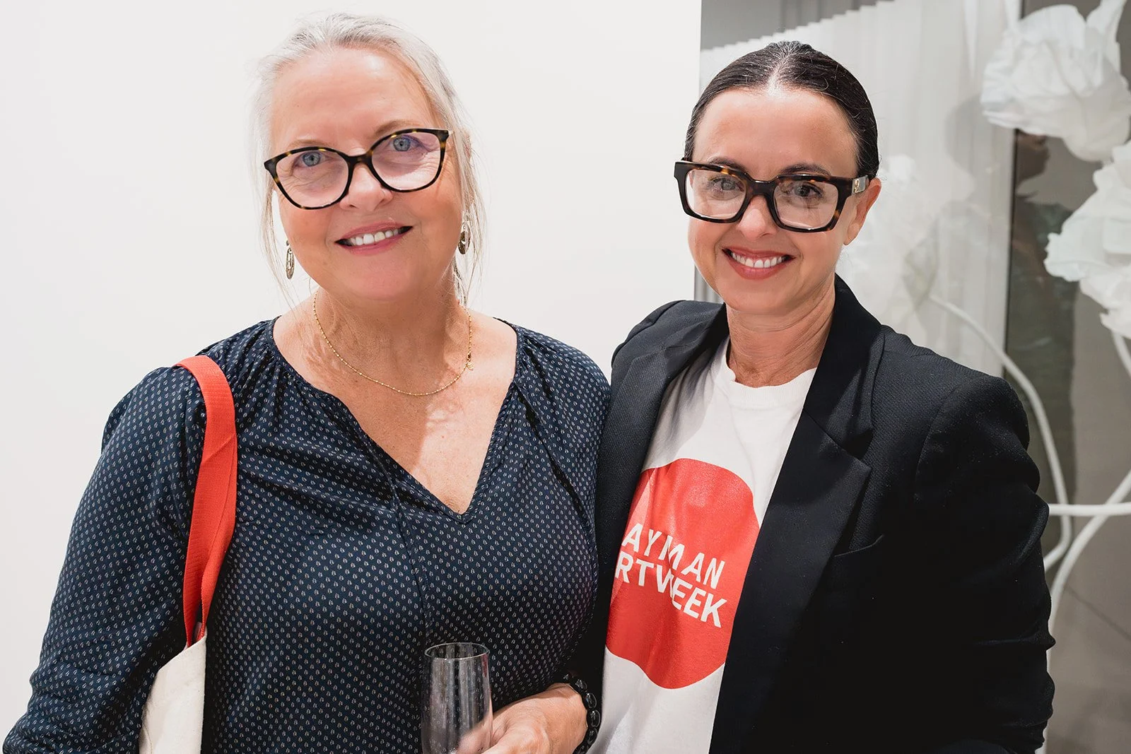 Natalie Urquhart and guest at IDG's exhibition "Spatial Dialogue" during Cayman Art Week 2026.