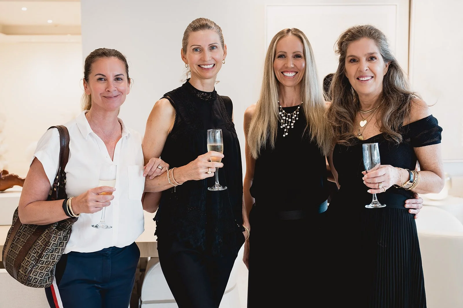 Guests at IDG with owner Ashleigh Lund during Cayman Art Week 2026.